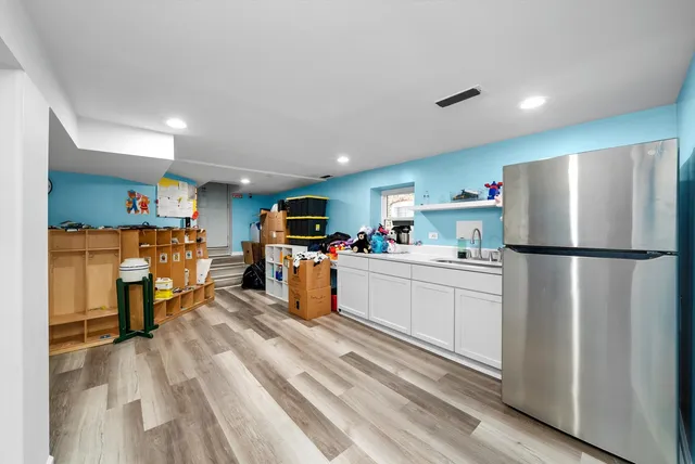 a view of a front of a house with a yard