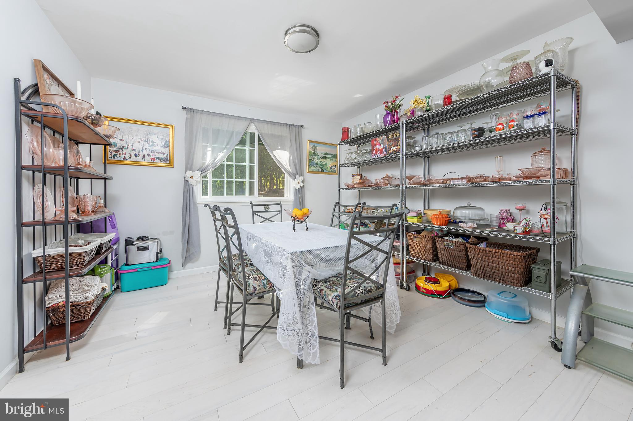 10 Loretta Boulevard Sicklerville, NJ 08081 - Photo 10 of 22 a dining room with a wooden table and chairs