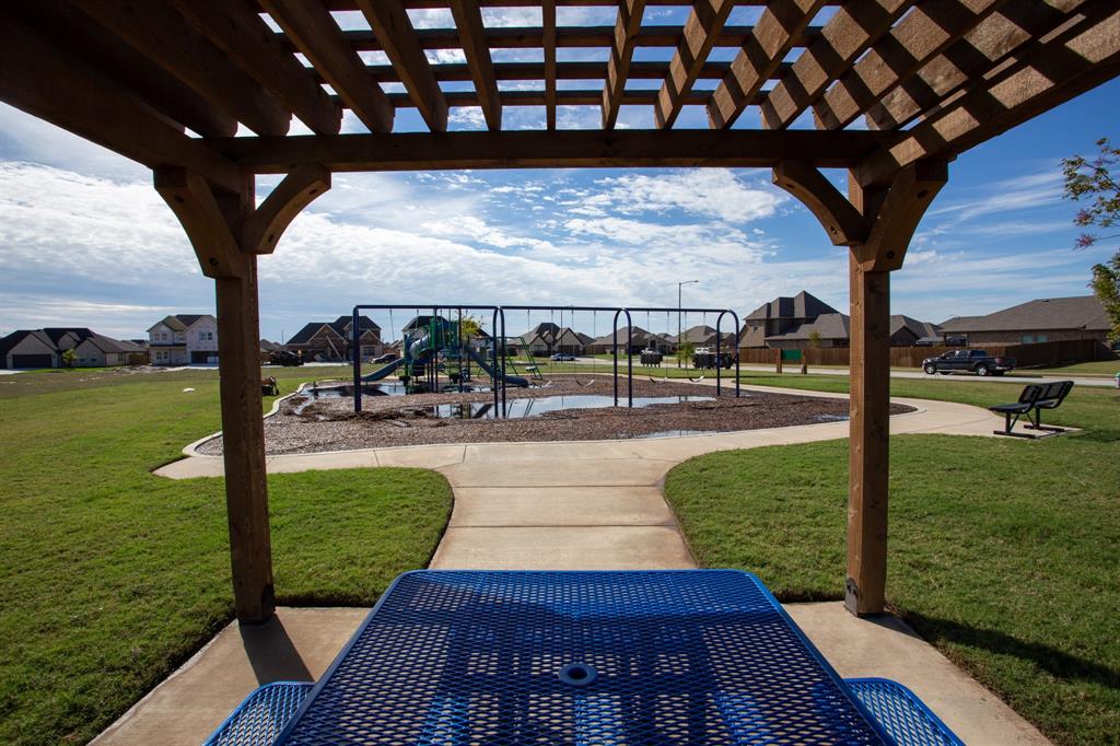 704 Ransom Way Greenville, TX 75402 - Photo 21 of 23 View of patio / terrace with a residential view and a pergola