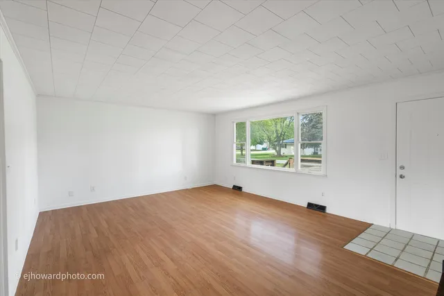 an empty room with window