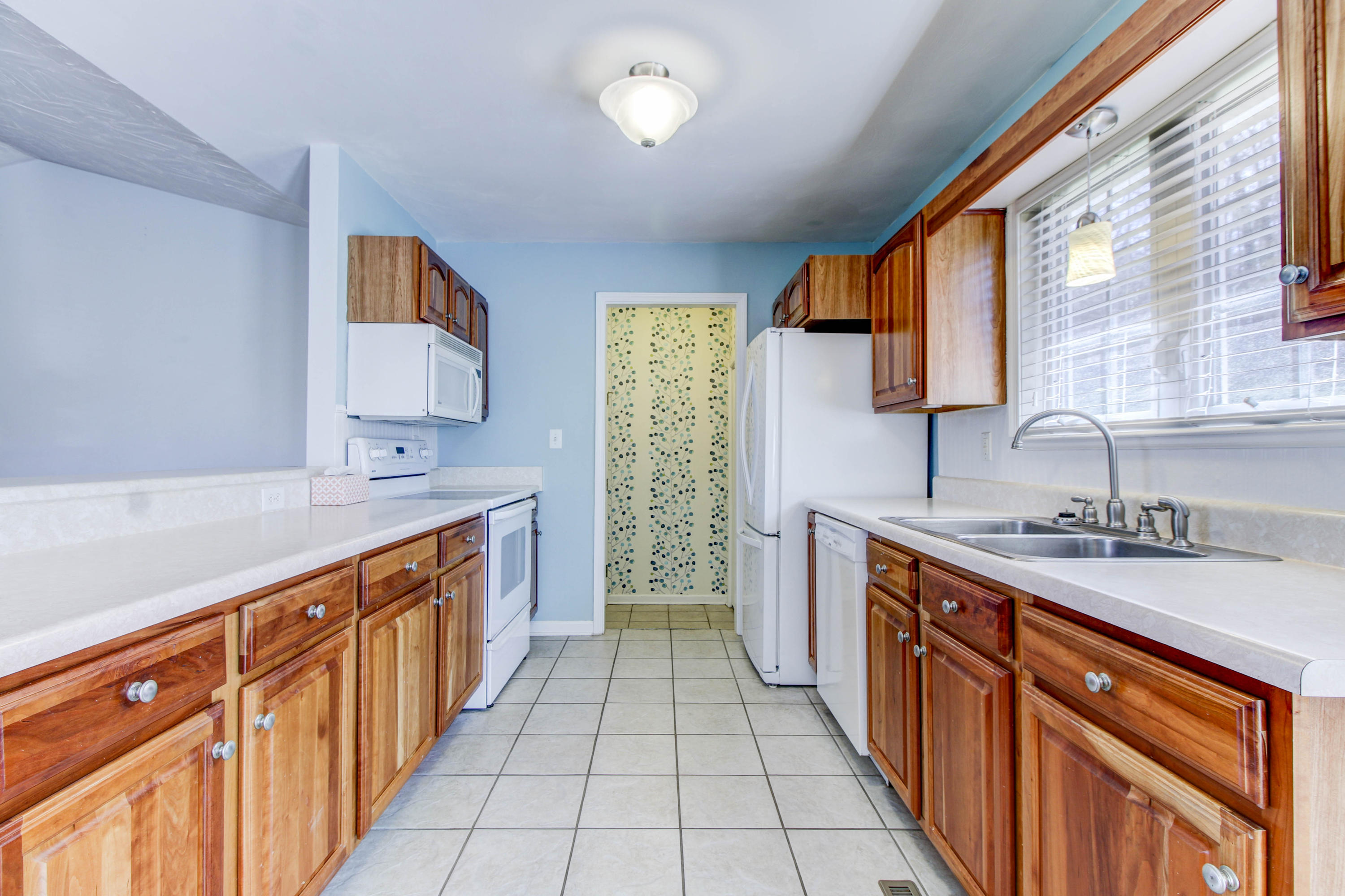 1546 Pike Road Montvale, VA 24122 - Photo 14 of 44 a kitchen with stainless steel appliances a sink stove and cabinets