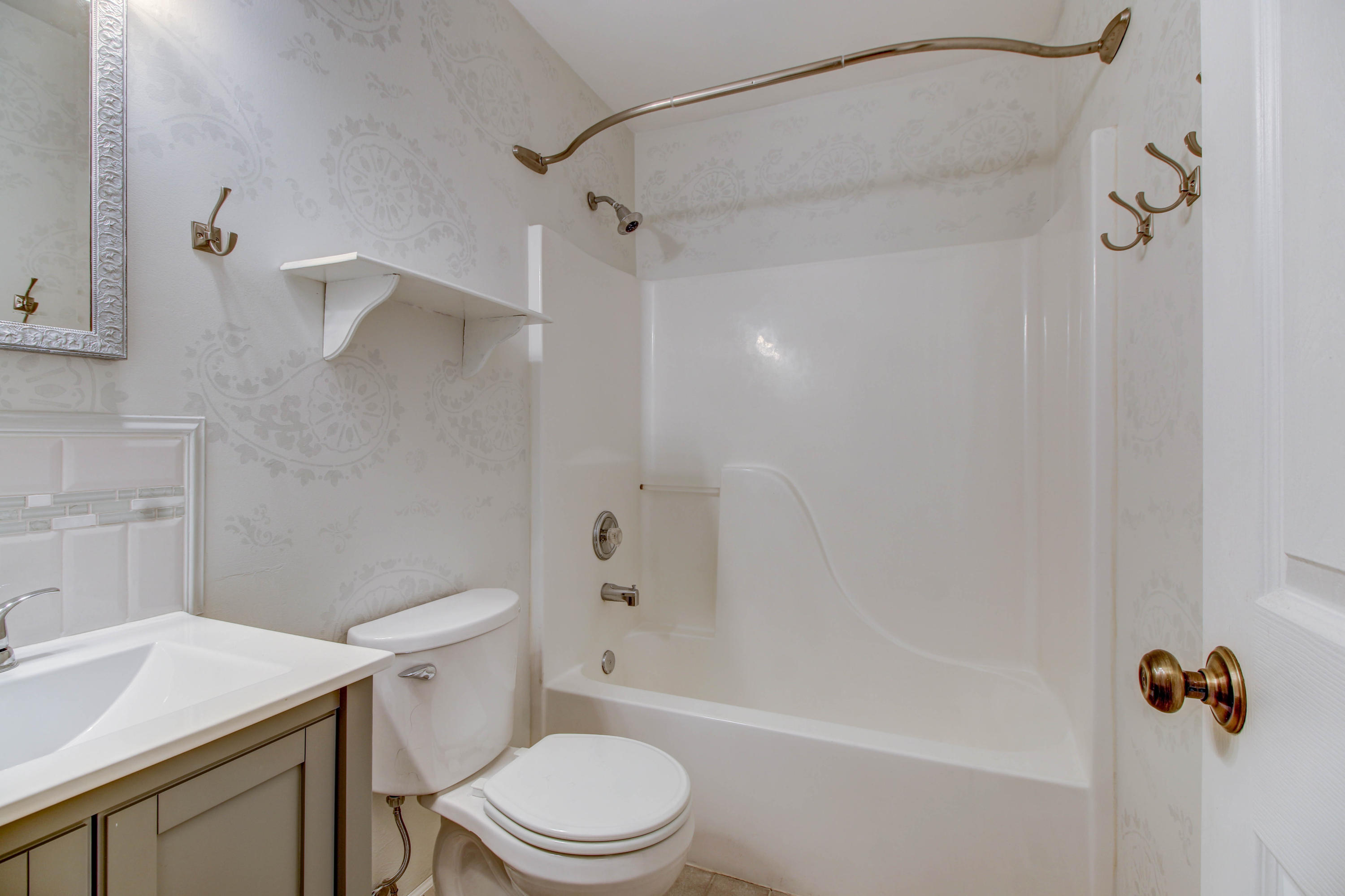 1546 Pike Road Montvale, VA 24122 - Photo 19 of 44 a white toilet sitting next to a bath tub