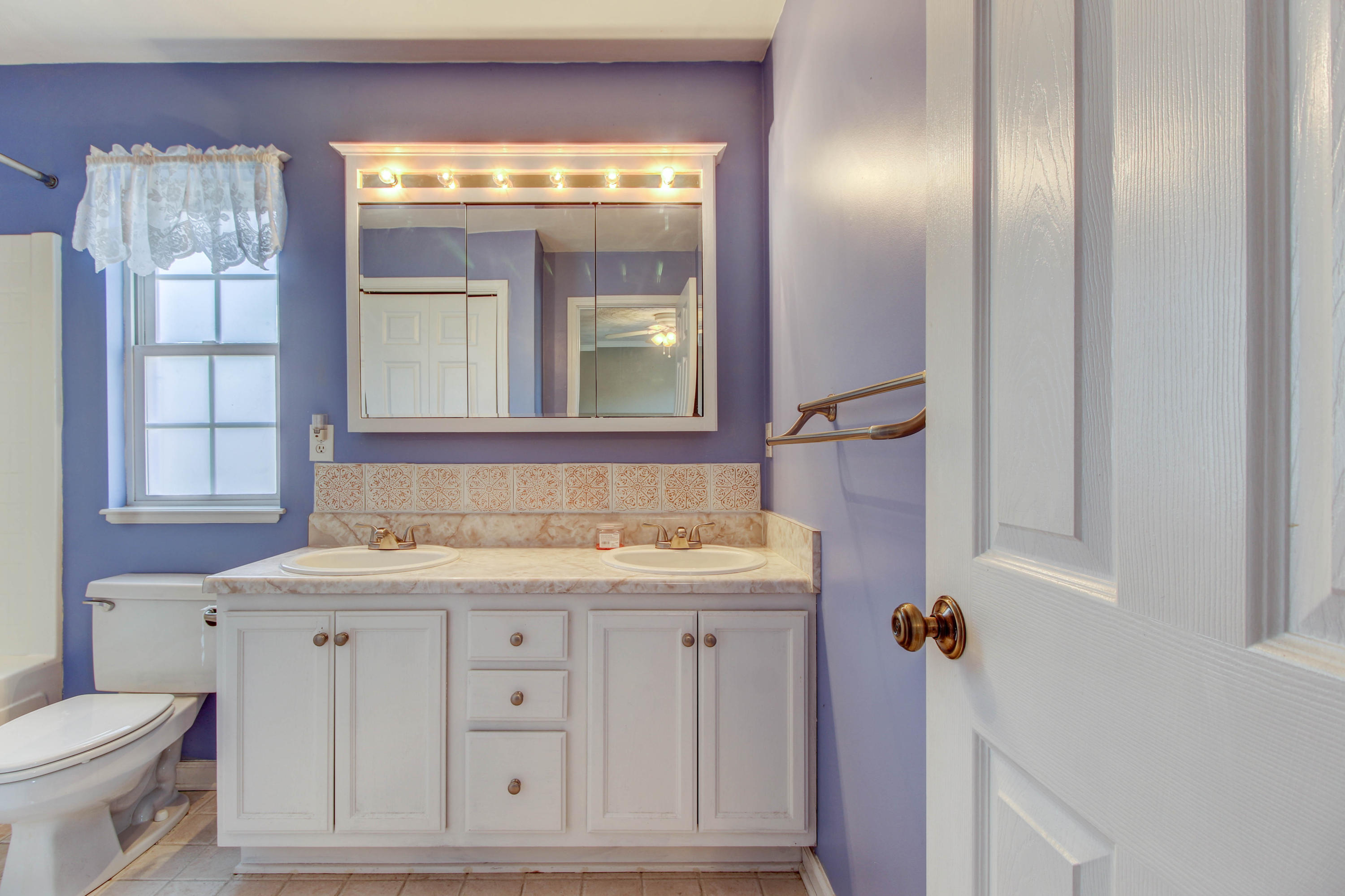 1546 Pike Road Montvale, VA 24122 - Photo 22 of 44 a bathroom with a sink a toilet and a mirror