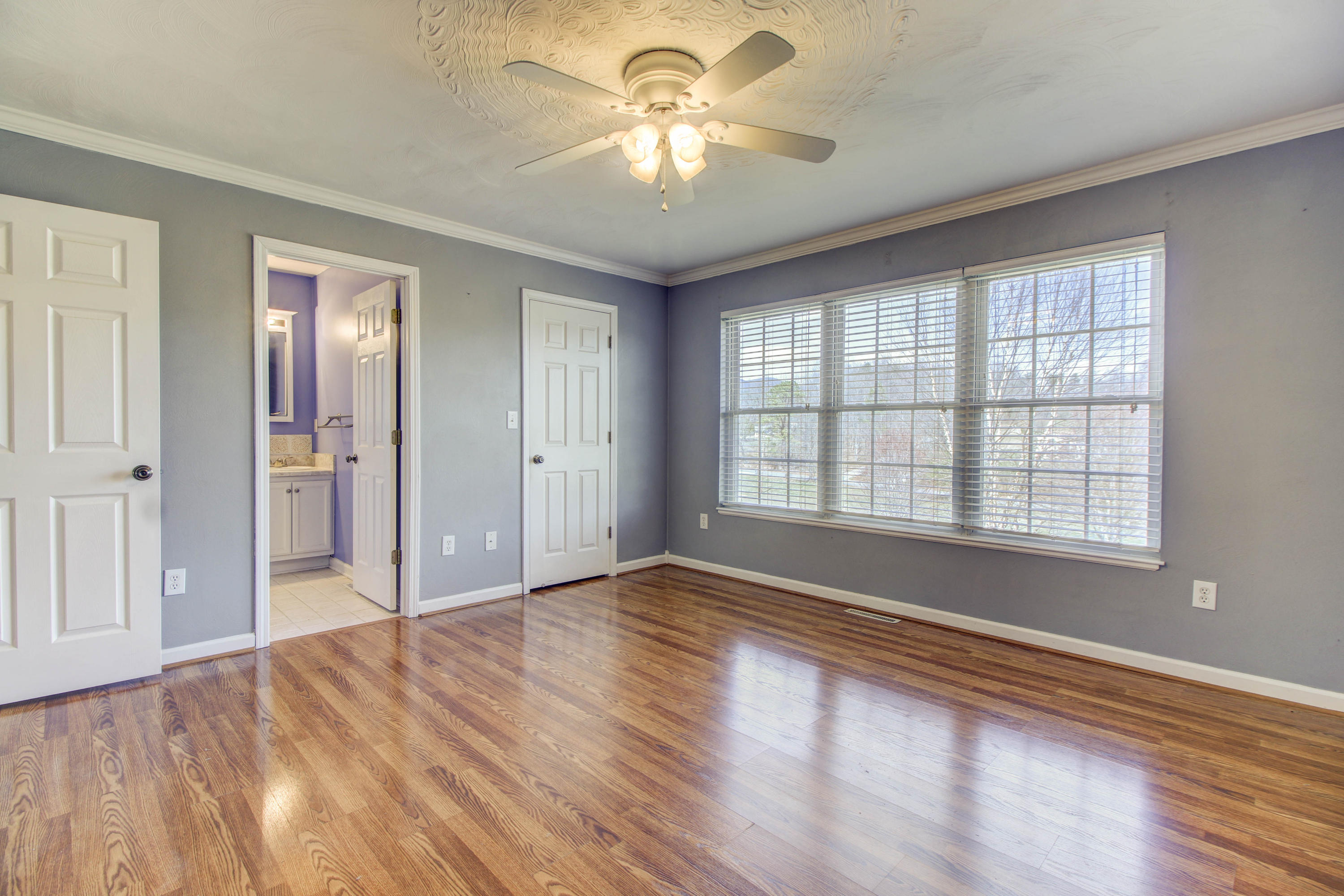 1546 Pike Road Montvale, VA 24122 - Photo 25 of 44 a view of empty room with wooden floor and fan