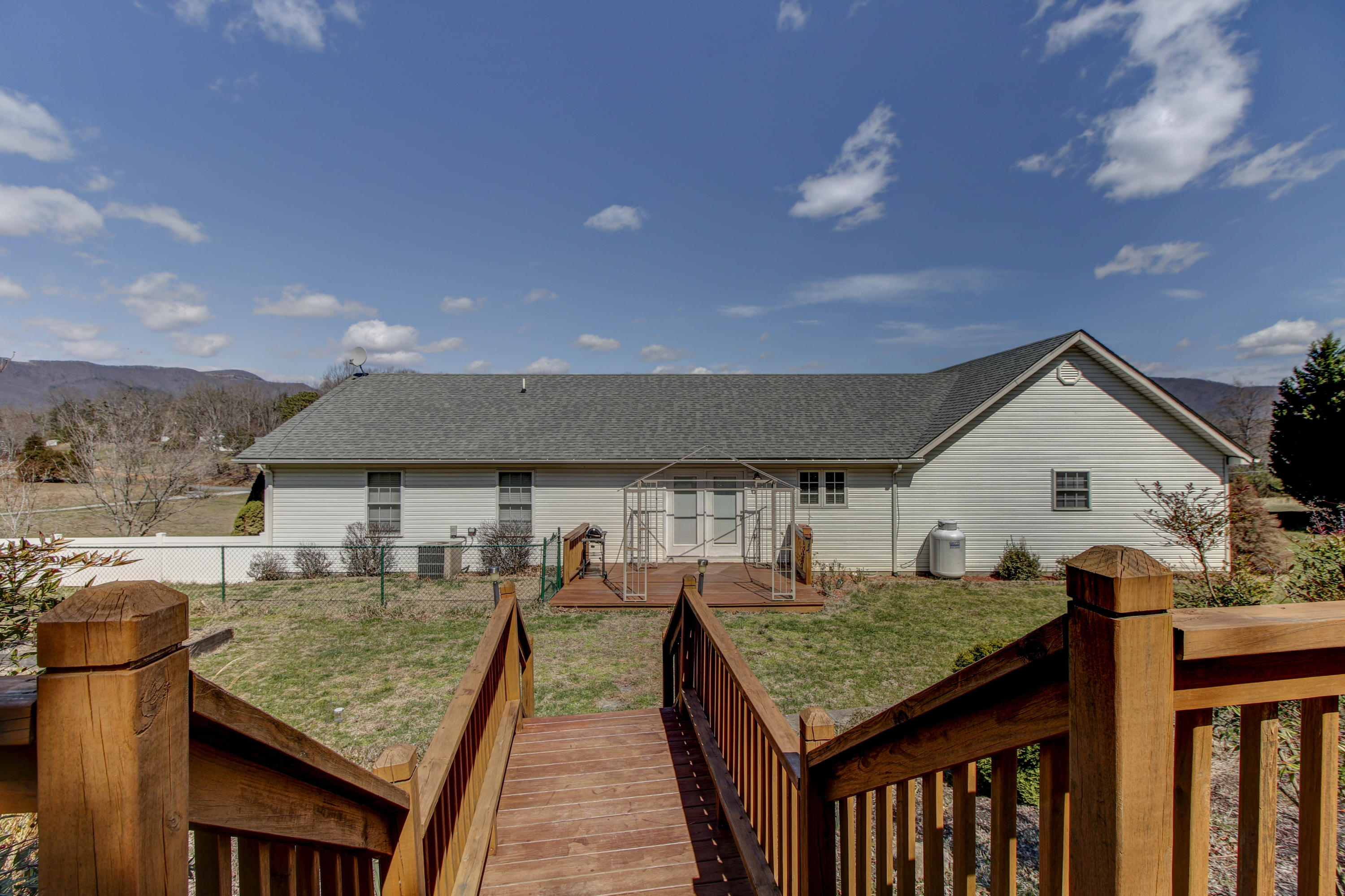 1546 Pike Road Montvale, VA 24122 - Photo 30 of 44 a terrace of a house with wooden floor and outdoor seating