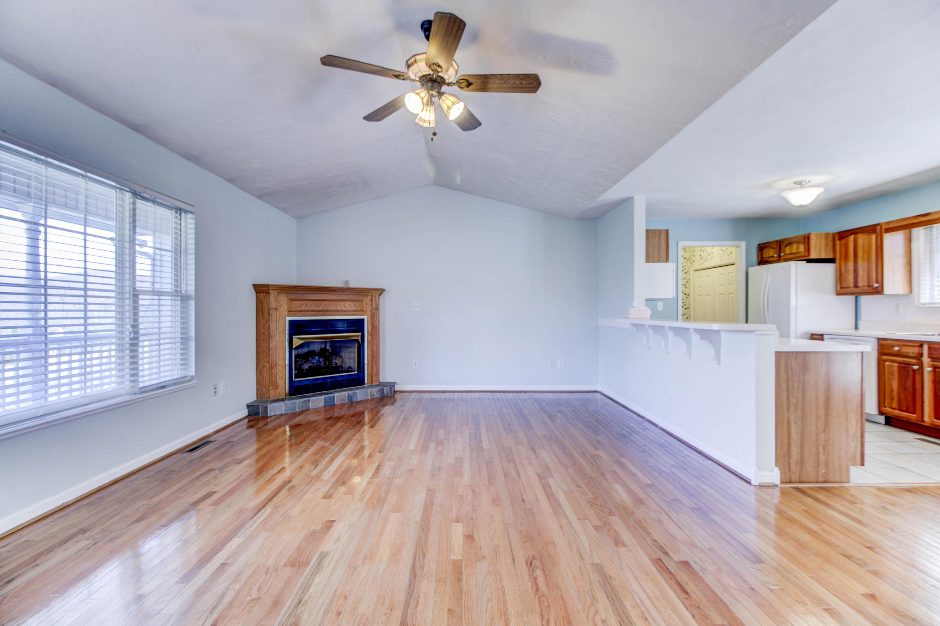 1546 Pike Road Montvale, VA 24122 - Photo 8 of 44 wooden floor in an empty room with a window