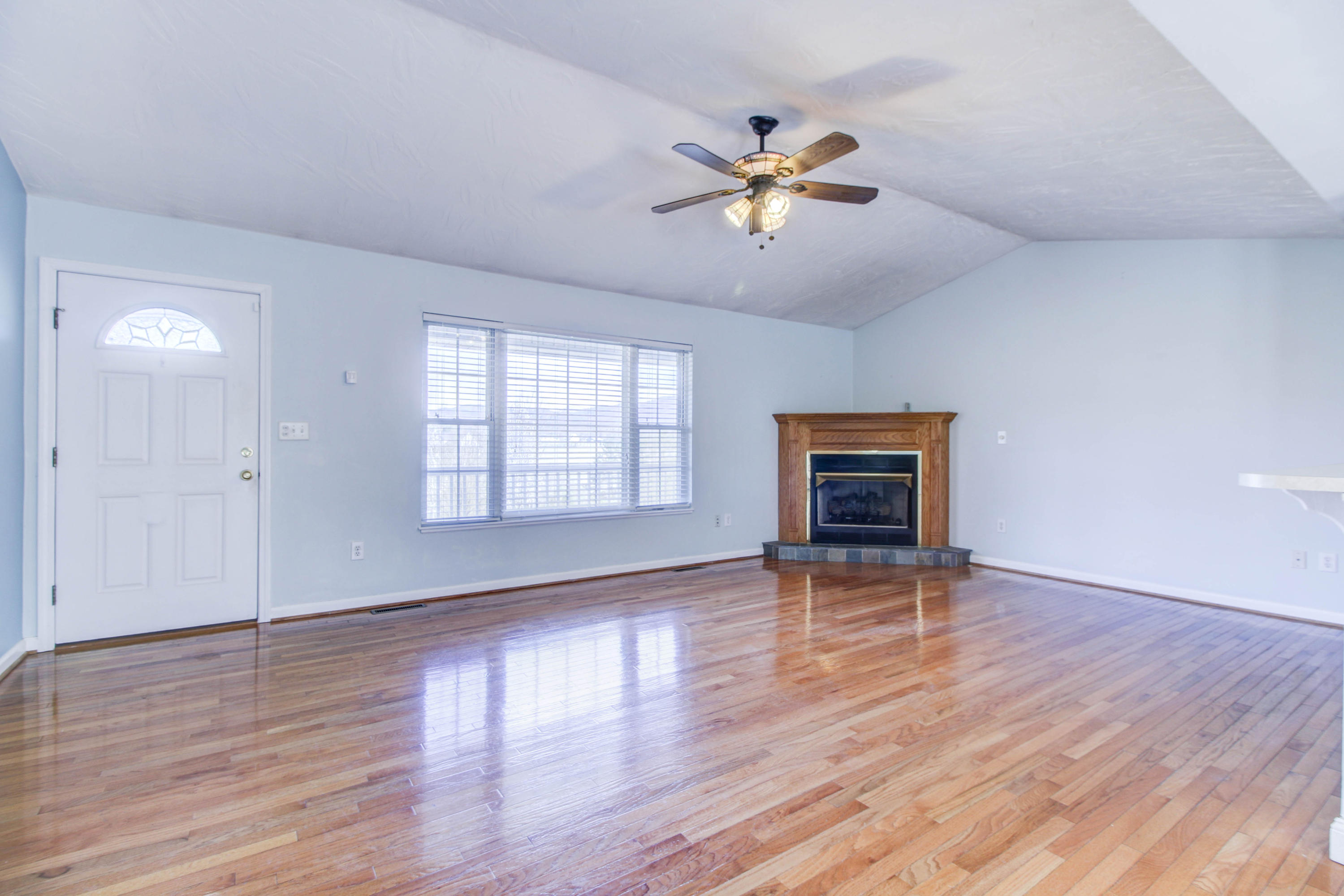 1546 Pike Road Montvale, VA 24122 - Photo 10 of 44 a view of an empty room with wooden floor and a window