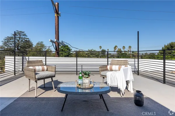 a view of a terrace with seating space