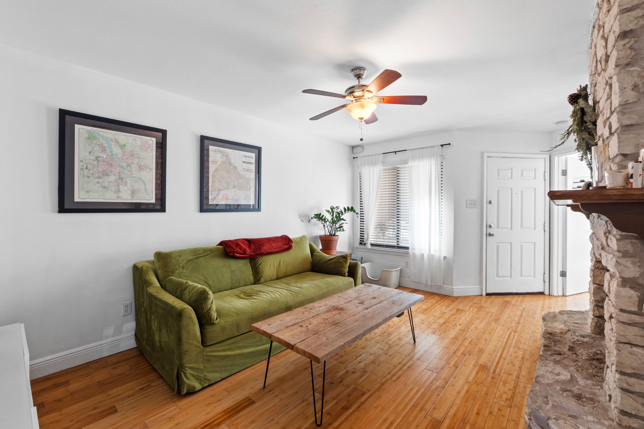 1750 Timber Ridge Road, Unit 102 Austin, TX 78741 - Photo 13 of 24 a living room with furniture and a wooden floor