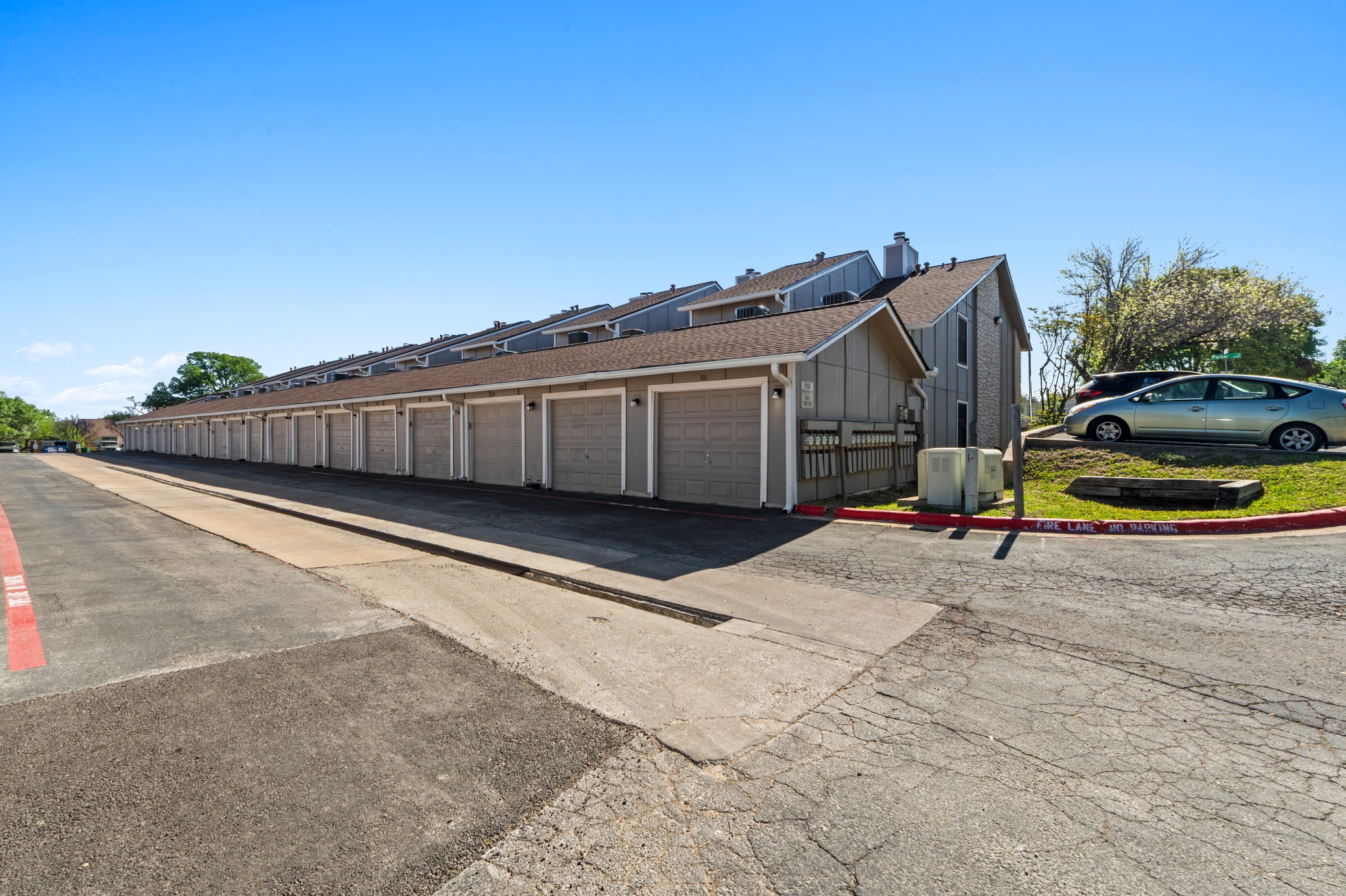 1750 Timber Ridge Road, Unit 102 Austin, TX 78741 - Photo 24 of 24 a view of a wooden house with a road