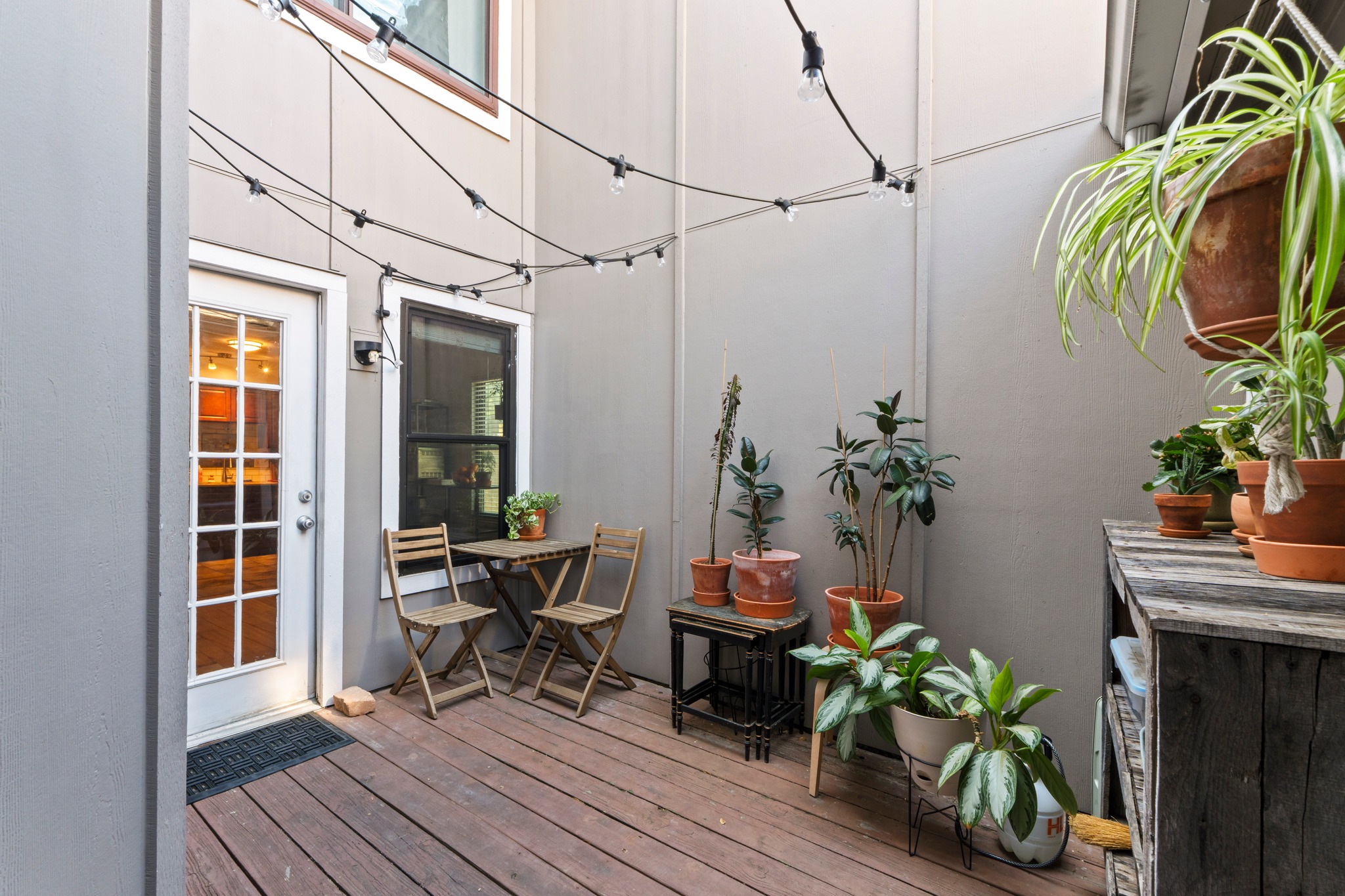 1750 Timber Ridge Road, Unit 102 Austin, TX 78741 - Photo 4 of 24 a view of a dinning table and chairs in patio of the house