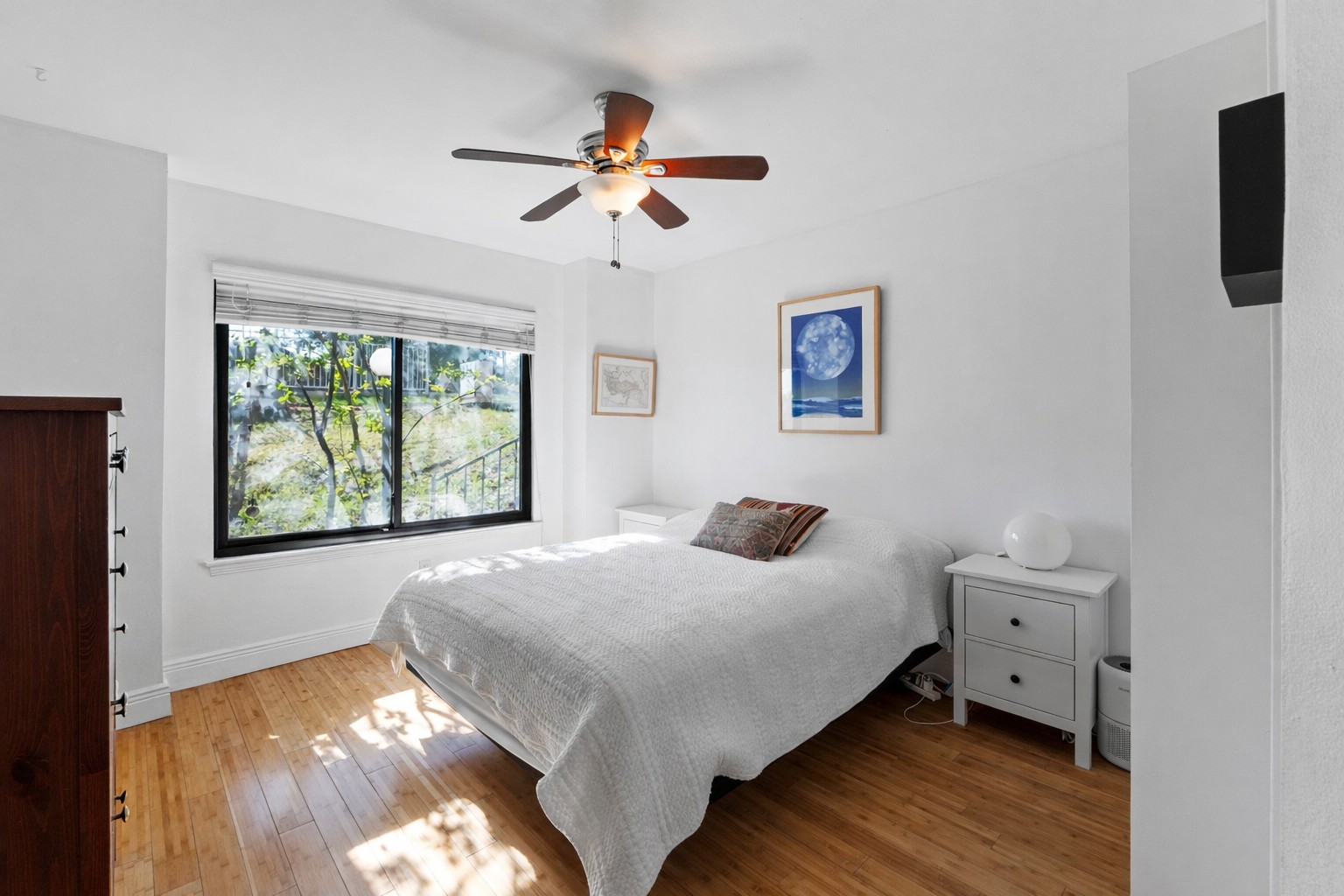 1750 Timber Ridge Road, Unit 102 Austin, TX 78741 - Photo 6 of 24 a bedroom with a bed and a window