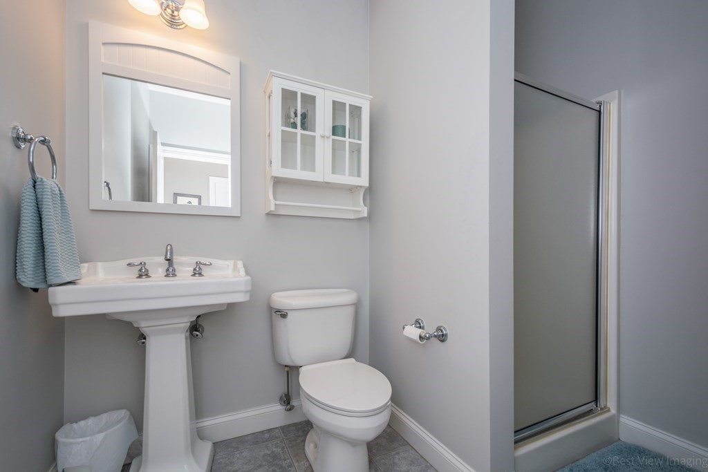 5 Nelson Court Mendon, MA 01756 - Photo 11 of 41 a bathroom with a toilet sink and mirror