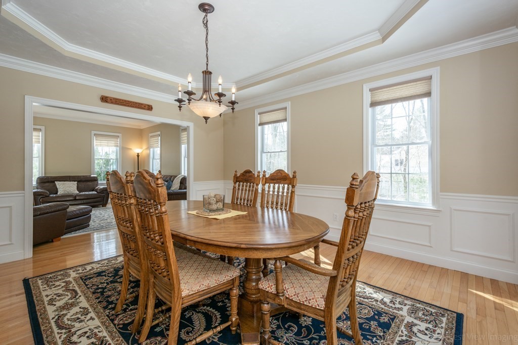5 Nelson Court Mendon, MA 01756 - Photo 13 of 41 a view of a a dining room with furniture window and wooden floor