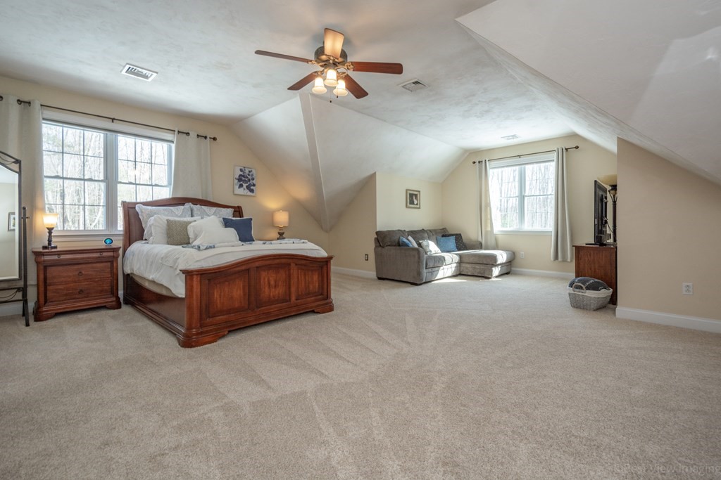 5 Nelson Court Mendon, MA 01756 - Photo 20 of 41 a living room with furniture and a ceiling fan