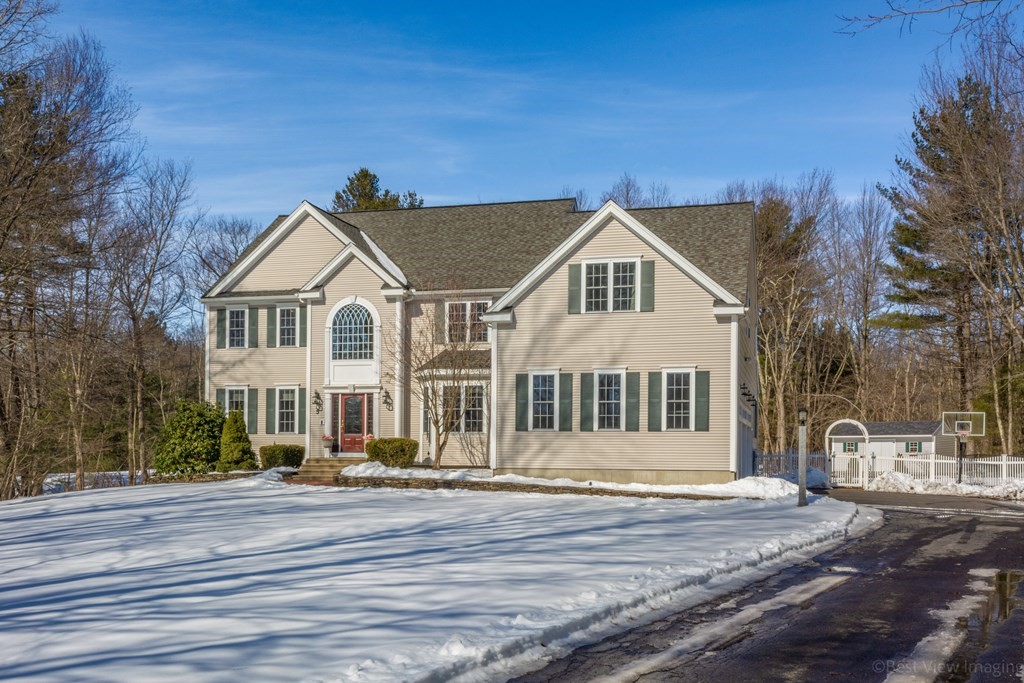 5 Nelson Court Mendon, MA 01756 - Photo 2 of 41 a front view of a house with a yard
