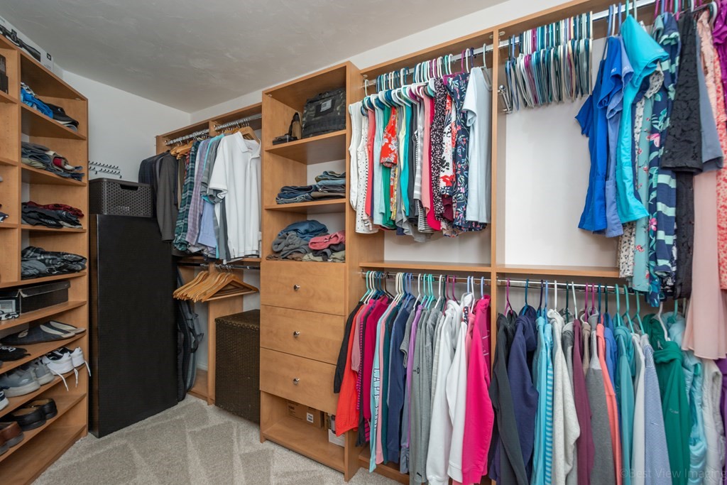 5 Nelson Court Mendon, MA 01756 - Photo 22 of 41 a view of walk in closet with clothes and shoes
