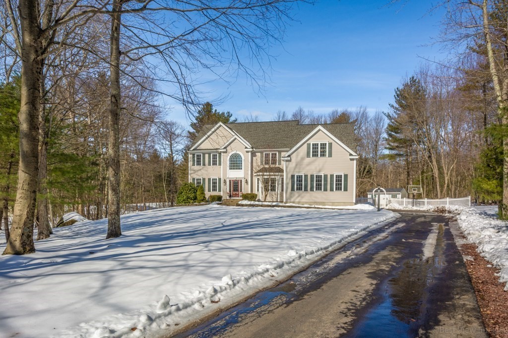 5 Nelson Court Mendon, MA 01756 - Photo 4 of 41 a view of a house and a yard