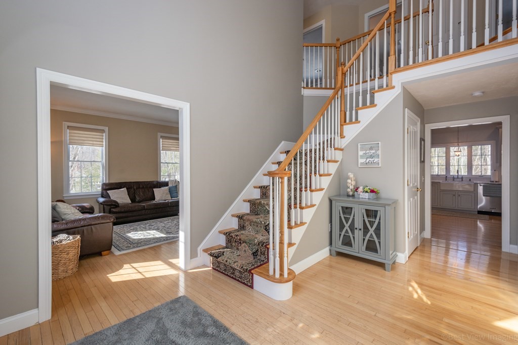 5 Nelson Court Mendon, MA 01756 - Photo 6 of 41 a view of entryway and hall with wooden floor