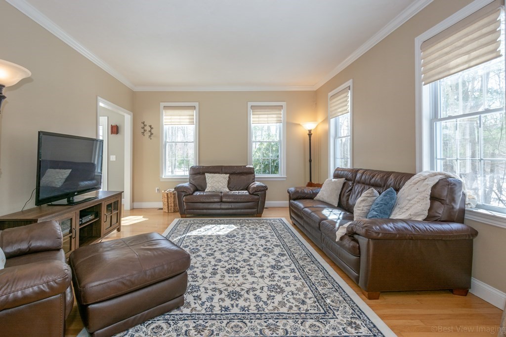 5 Nelson Court Mendon, MA 01756 - Photo 9 of 41 a living room with furniture and a flat screen tv