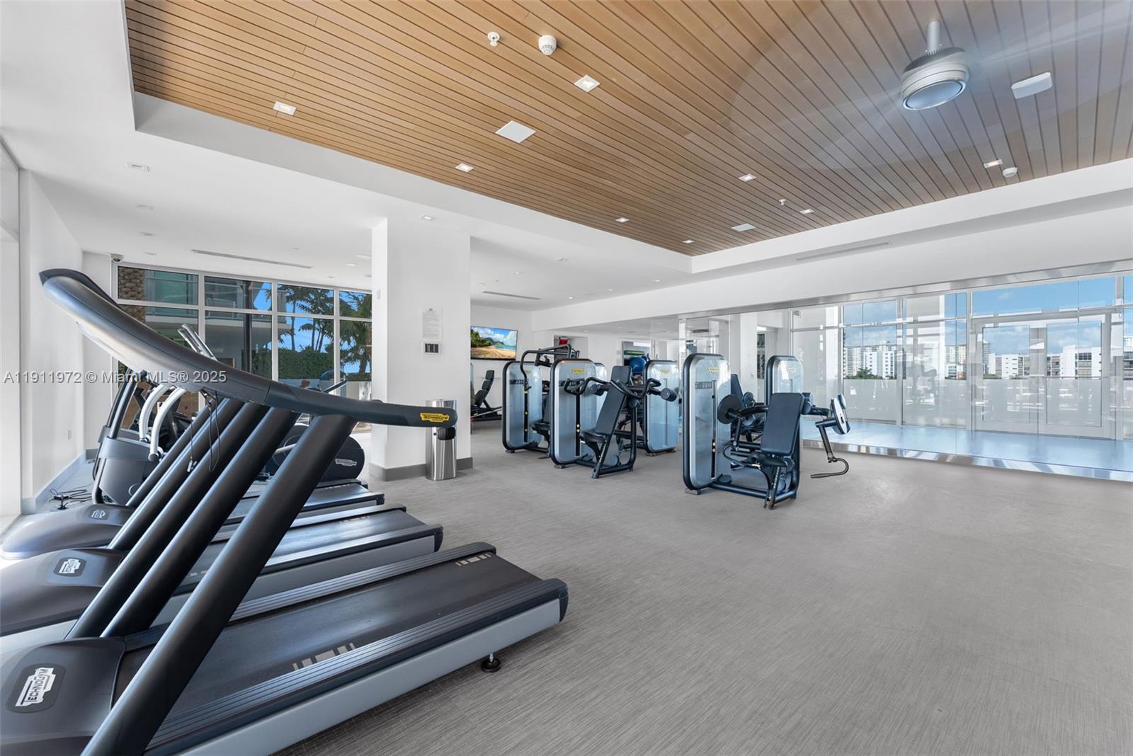 300 Sunny Isles Boulevard, Unit 4905 Sunny Isles Beach, FL 33160 - Photo 28 of 35 a view of a room with gym equipment