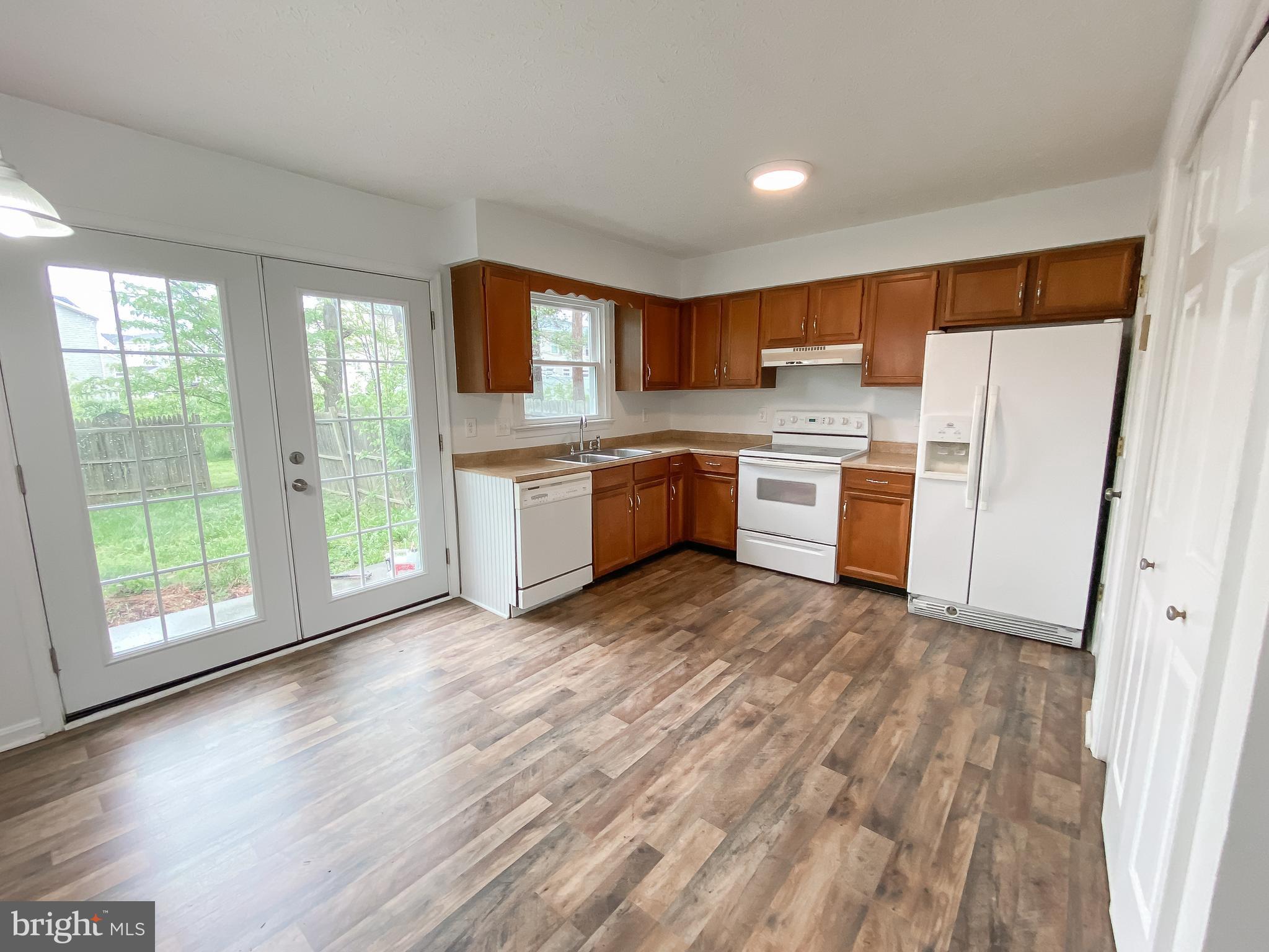 203 Brunswick Road Stephens City, VA 22655 - Photo 3 of 12 Kitchen w/French Doors to Rear Yard