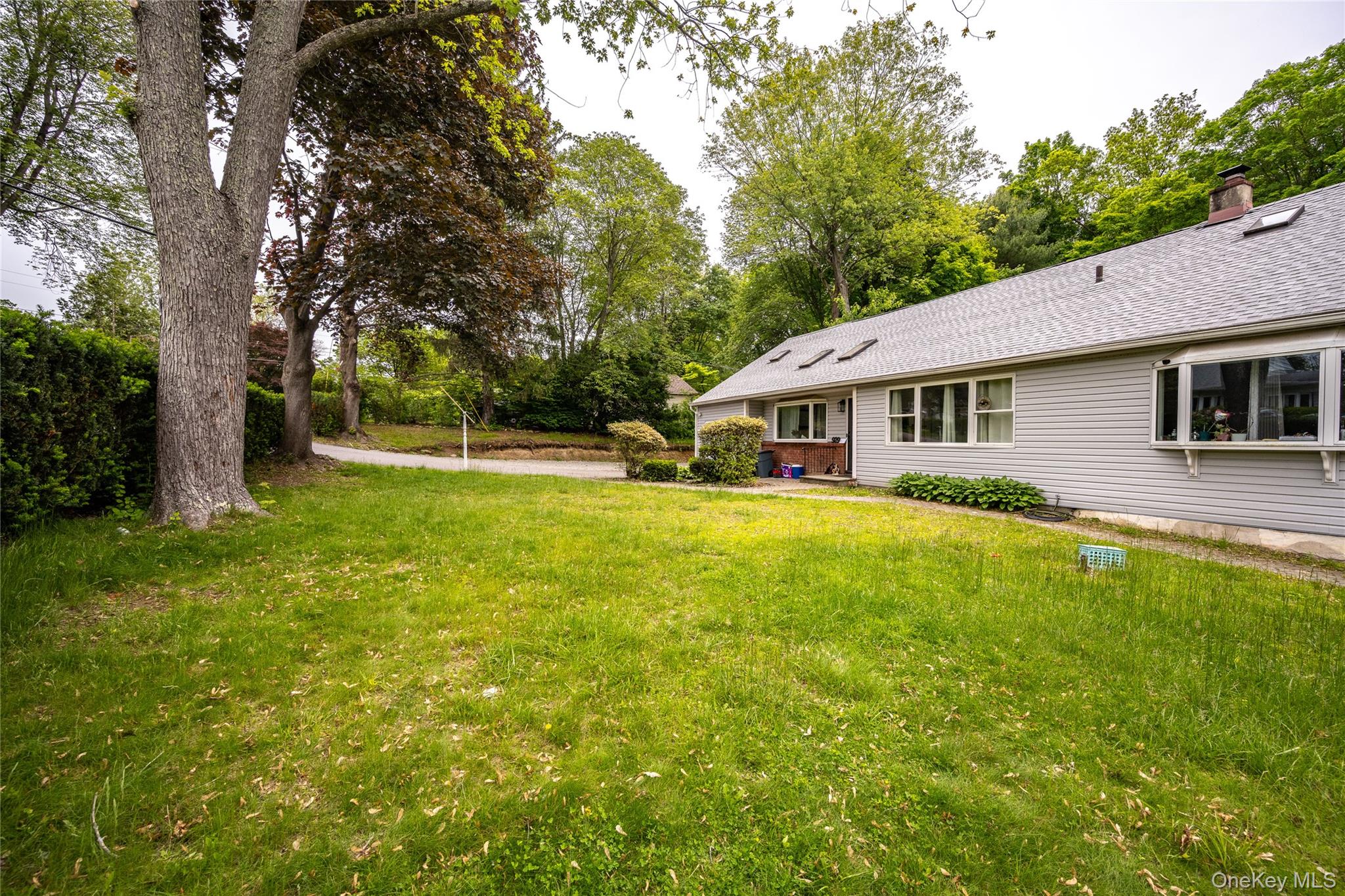 929 Fox Meadow Road Yorktown Heights, NY 10598 - Photo 3 of 39 View of grassy yard