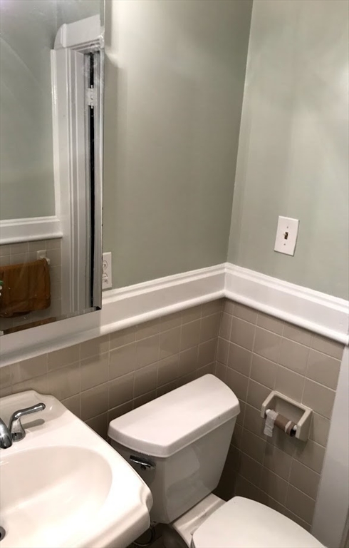 28 Beaconsfield Road, Unit 1 Brookline, MA 02445 - Photo 18 of 21 a bathroom with a toilet and a sink