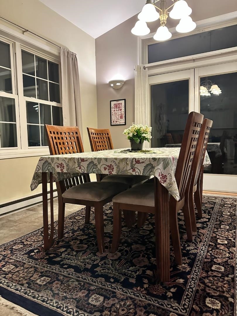 908 East Skyline Parkway Duluth, MN 55805 - Photo 15 of 40 Dining space featuring a chandelier