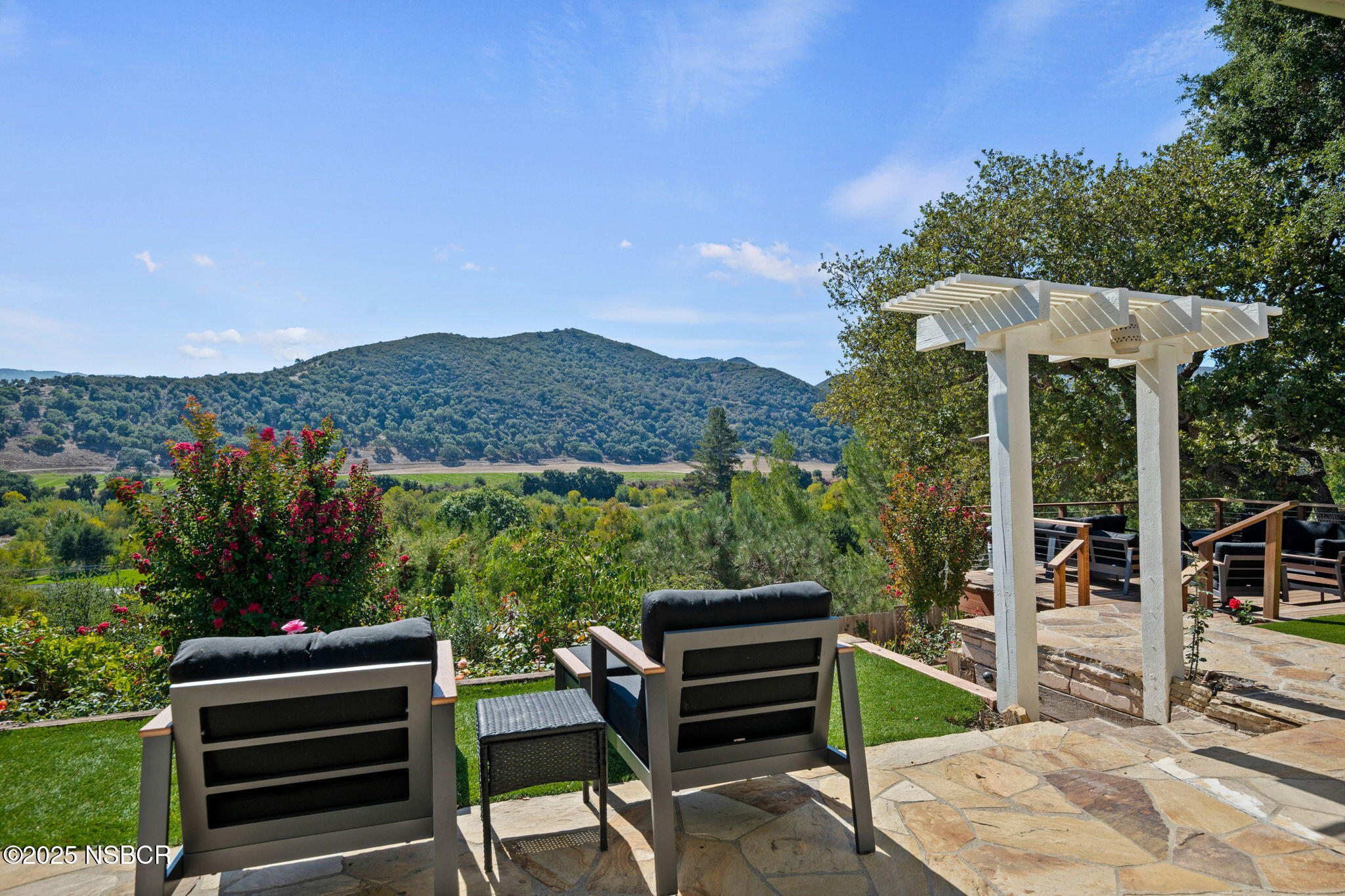 137 3rd Street Solvang, CA 93463 - Photo 23 of 48 a view of a patio with a table chairs and a grill