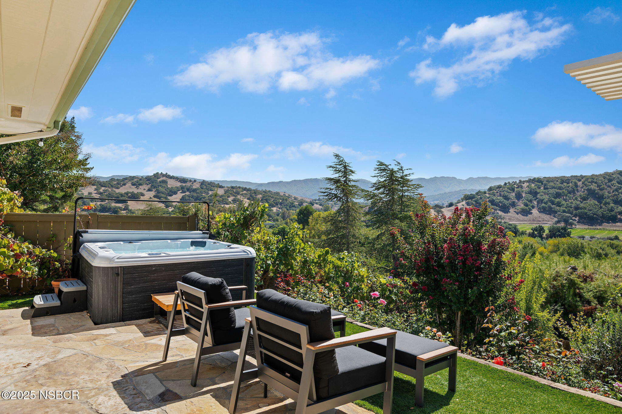 137 3rd Street Solvang, CA 93463 - Photo 24 of 48 a view of a chairs and table in patio with a yard