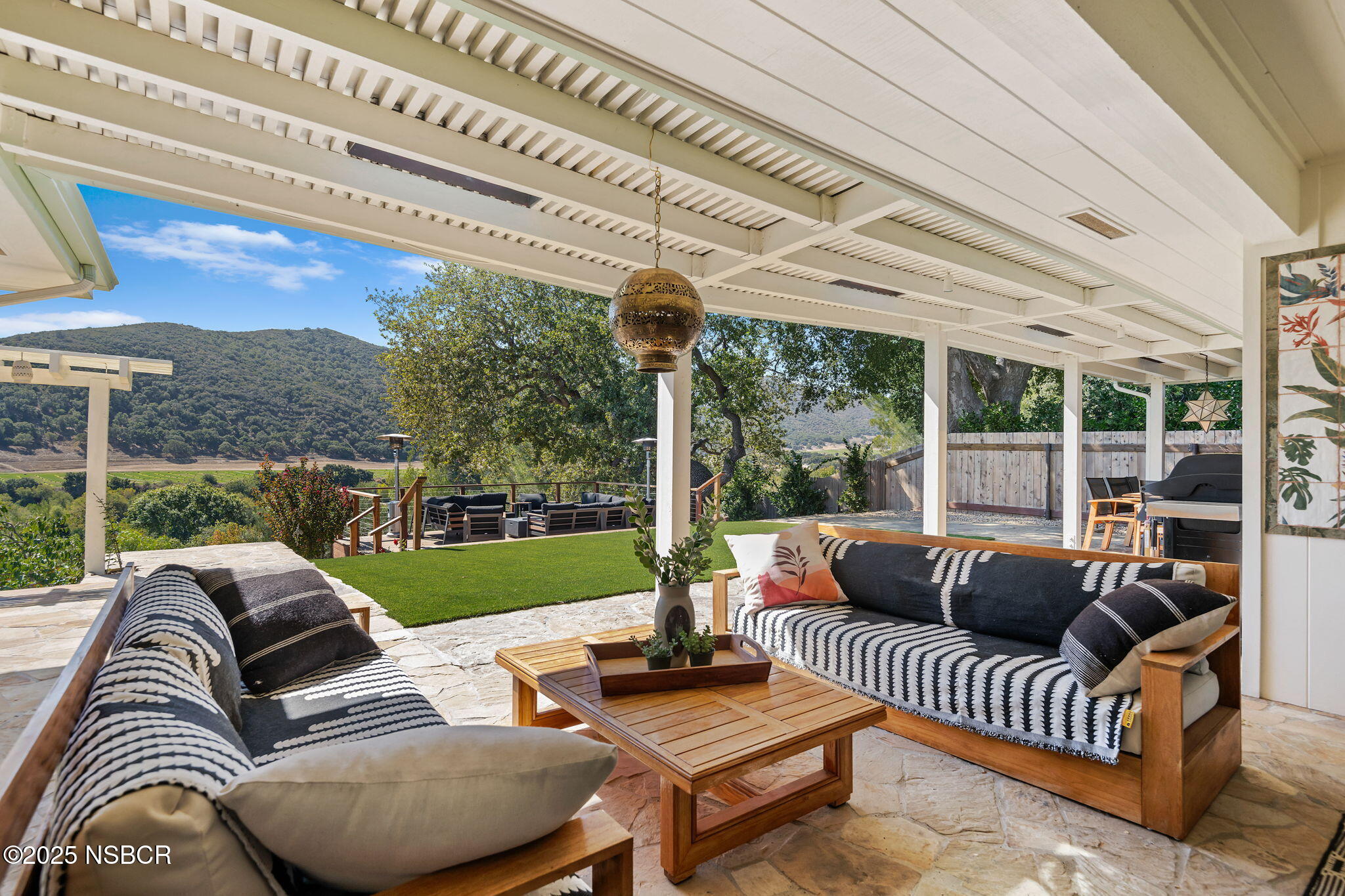 137 3rd Street Solvang, CA 93463 - Photo 28 of 48 a outdoor living space with patio furniture and garden view