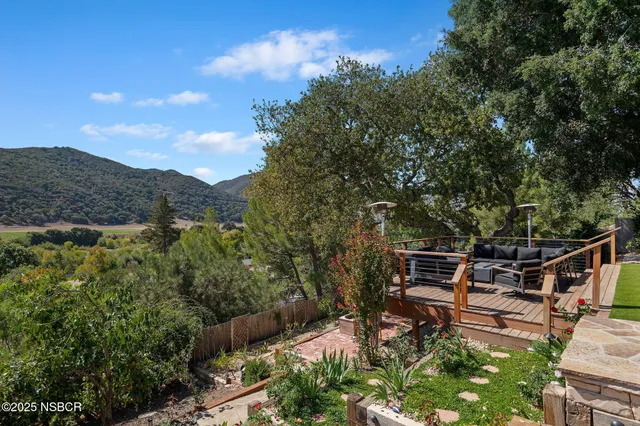 a view of a terrace with sitting area