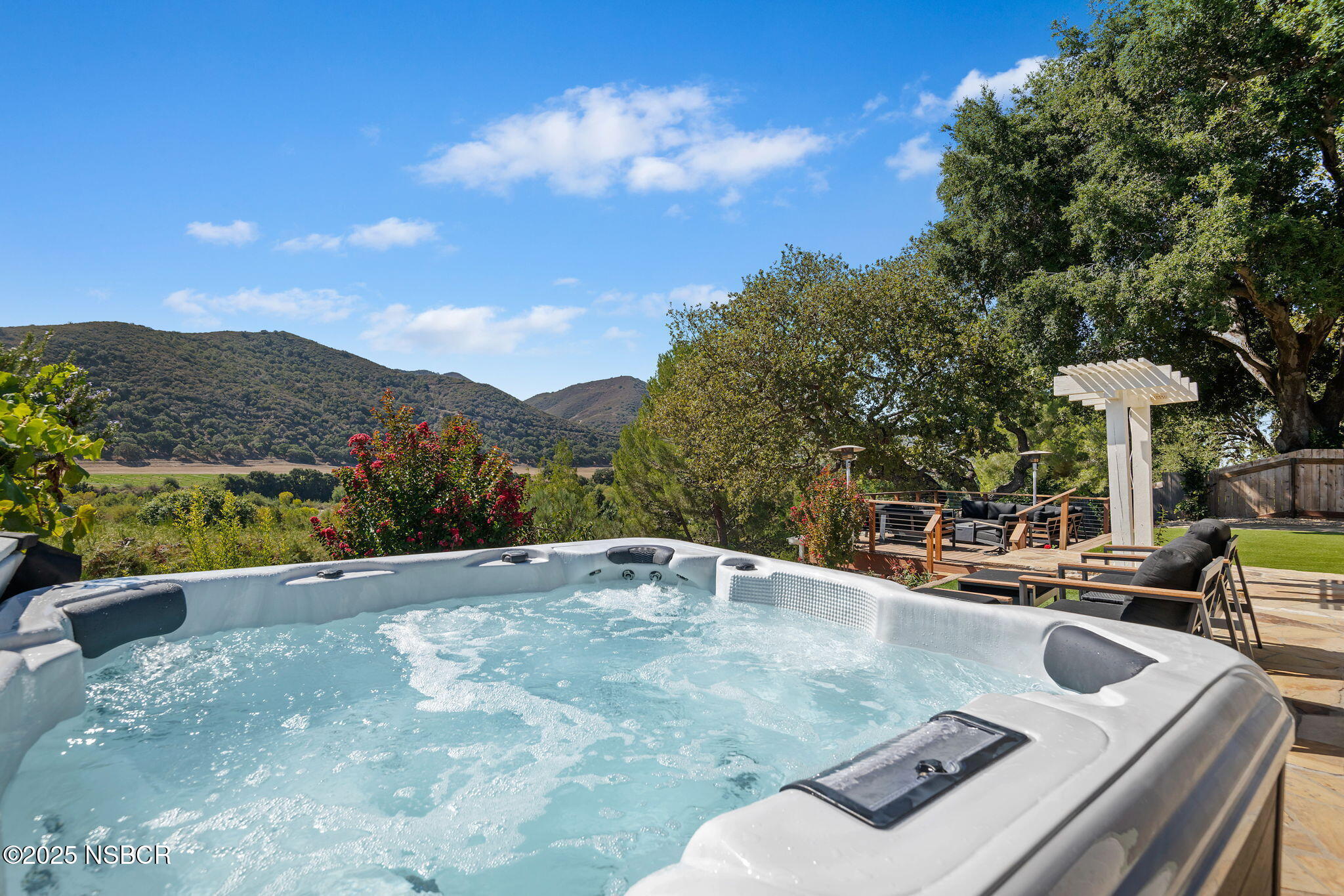 137 3rd Street Solvang, CA 93463 - Photo 33 of 48 a view of a patio with couches table and a fire pit