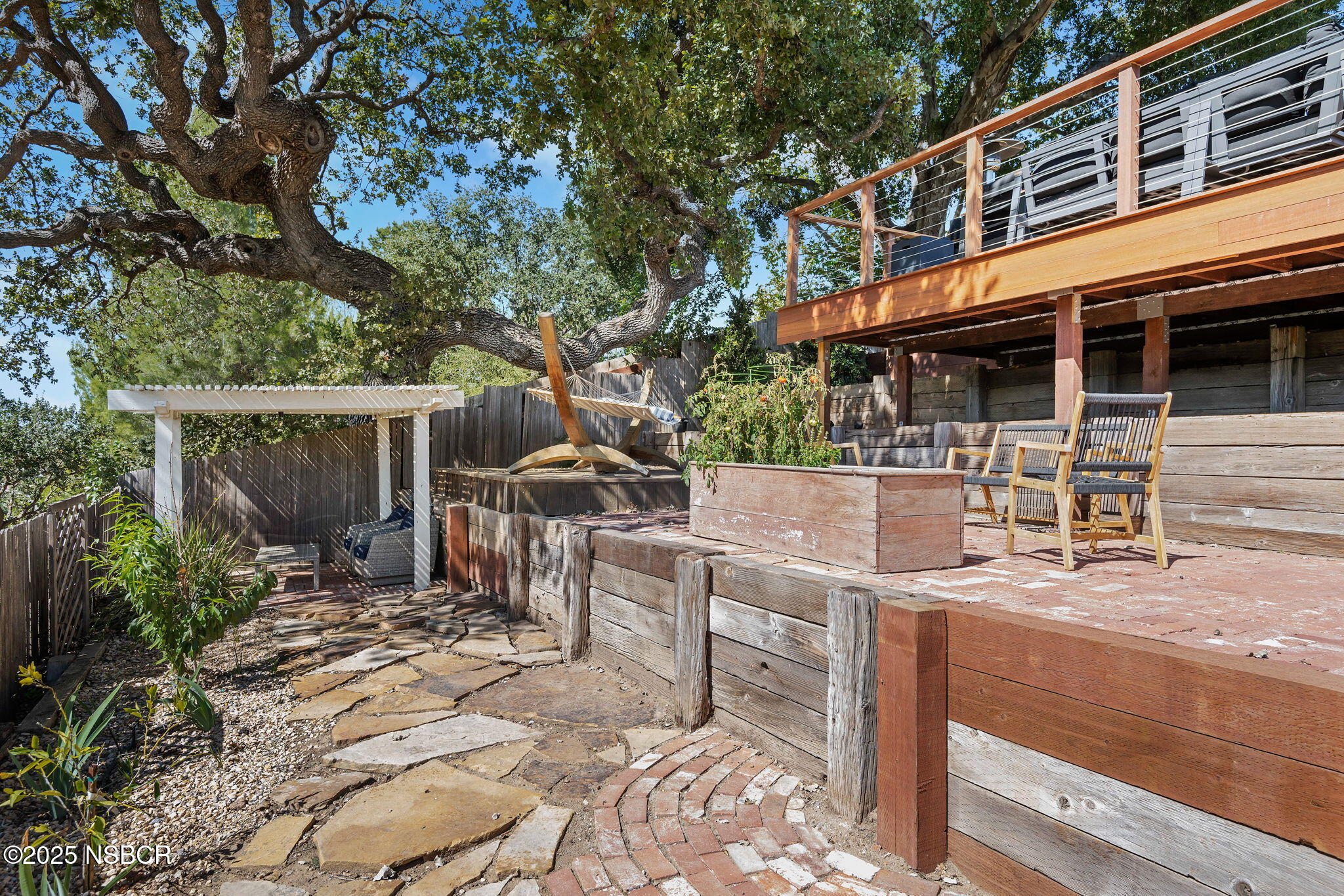 137 3rd Street Solvang, CA 93463 - Photo 34 of 48 a view of a house with backyard and sitting area