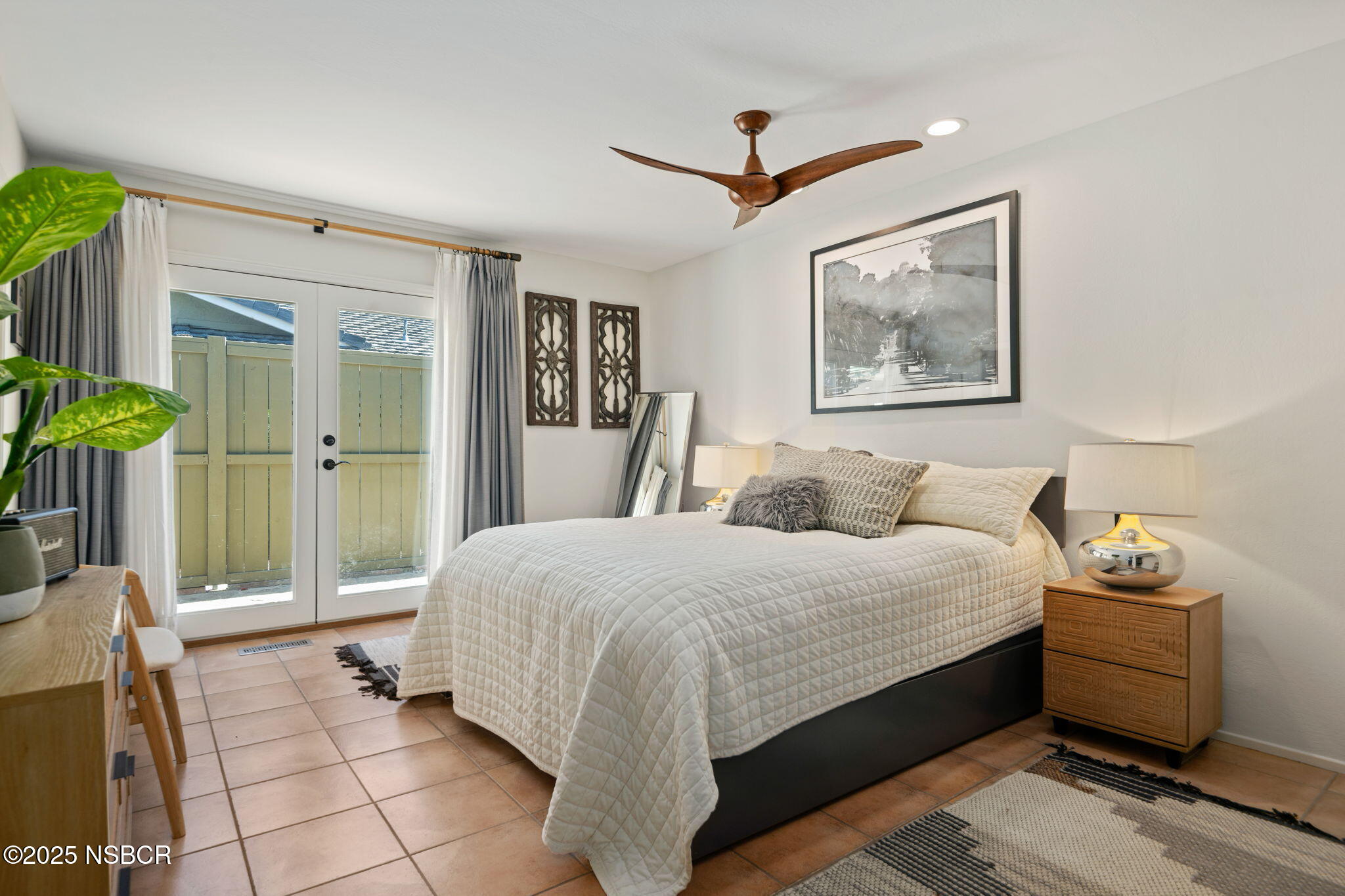 137 3rd Street Solvang, CA 93463 - Photo 36 of 48 a bedroom with a bed and a painting on the wall