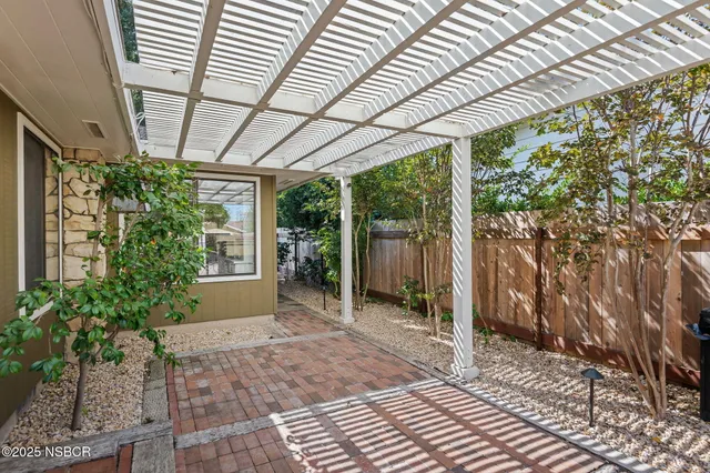 a house view with a outdoor space