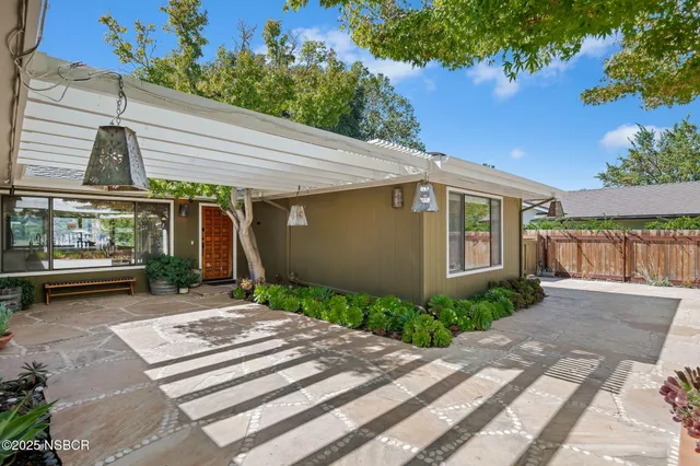 a view of a house with a patio