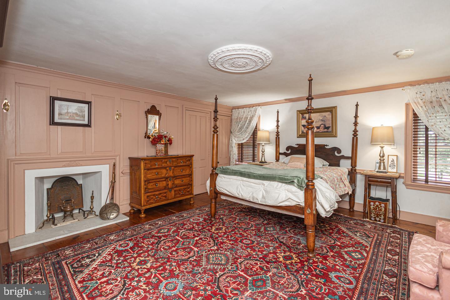 1224 Taylorsville Road Washington Crossing, PA 18977 - Photo 42 of 86 a bedroom with a bed and a fireplace