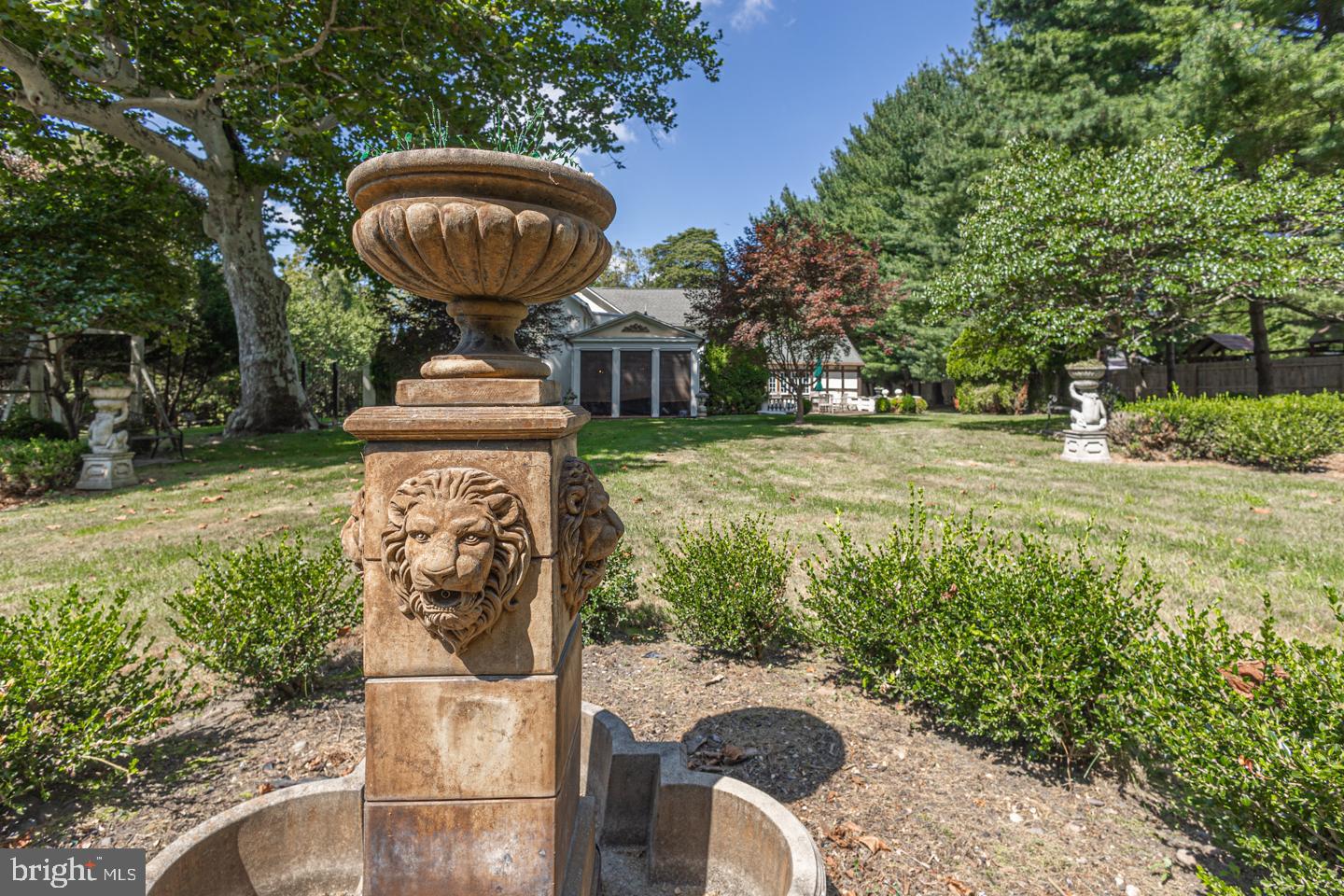 1224 Taylorsville Road Washington Crossing, PA 18977 - Photo 70 of 86 a view of a pathway of a house with a fountain back yard