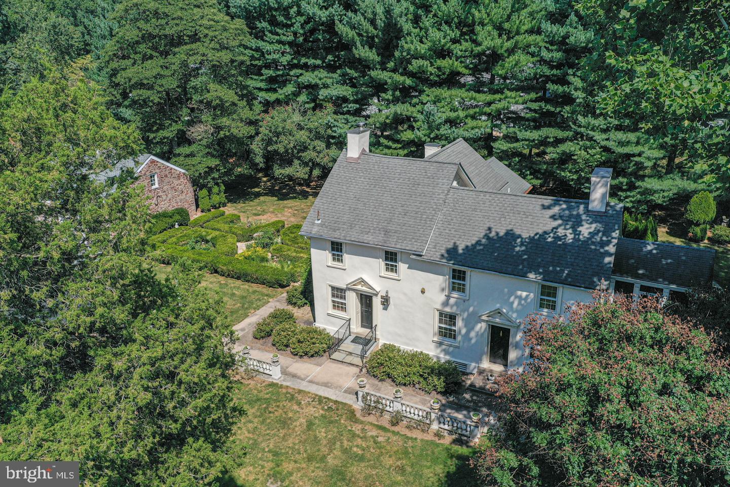 1224 Taylorsville Road Washington Crossing, PA 18977 - Photo 76 of 86 an aerial view of a house with a yard and trees all around