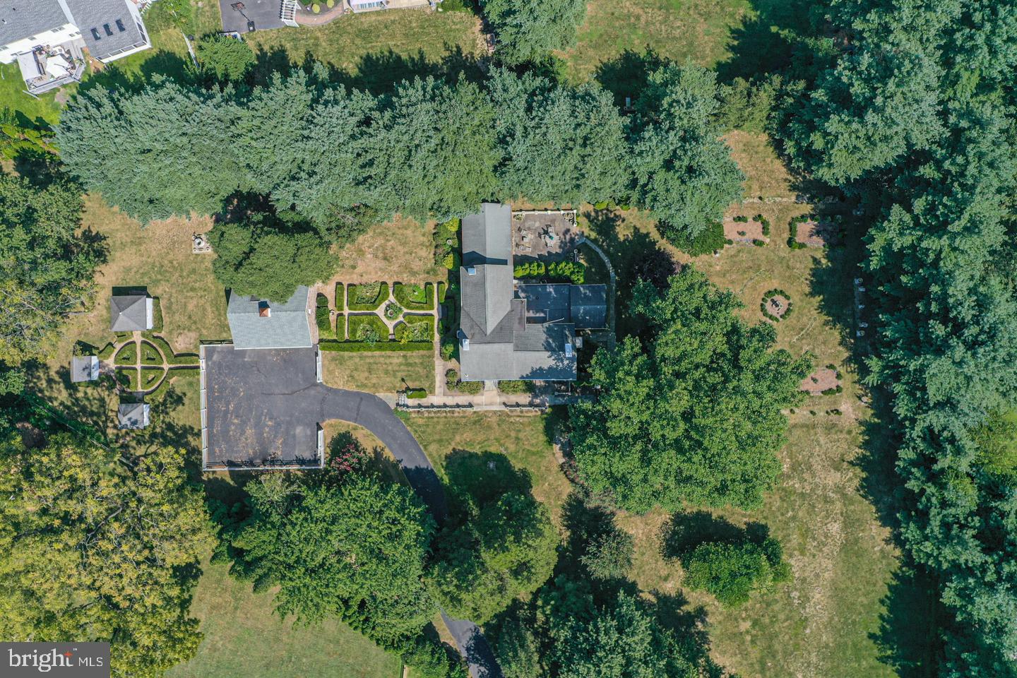 1224 Taylorsville Road Washington Crossing, PA 18977 - Photo 81 of 86 an aerial view of residential houses with outdoor space and trees all around
