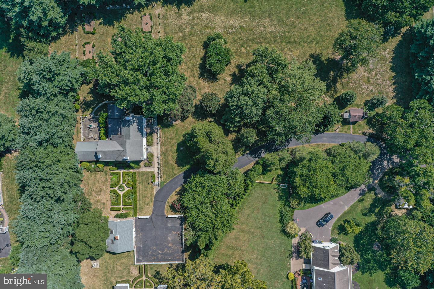1224 Taylorsville Road Washington Crossing, PA 18977 - Photo 82 of 86 an aerial view of a house with a yard swimming pool and outdoor seating