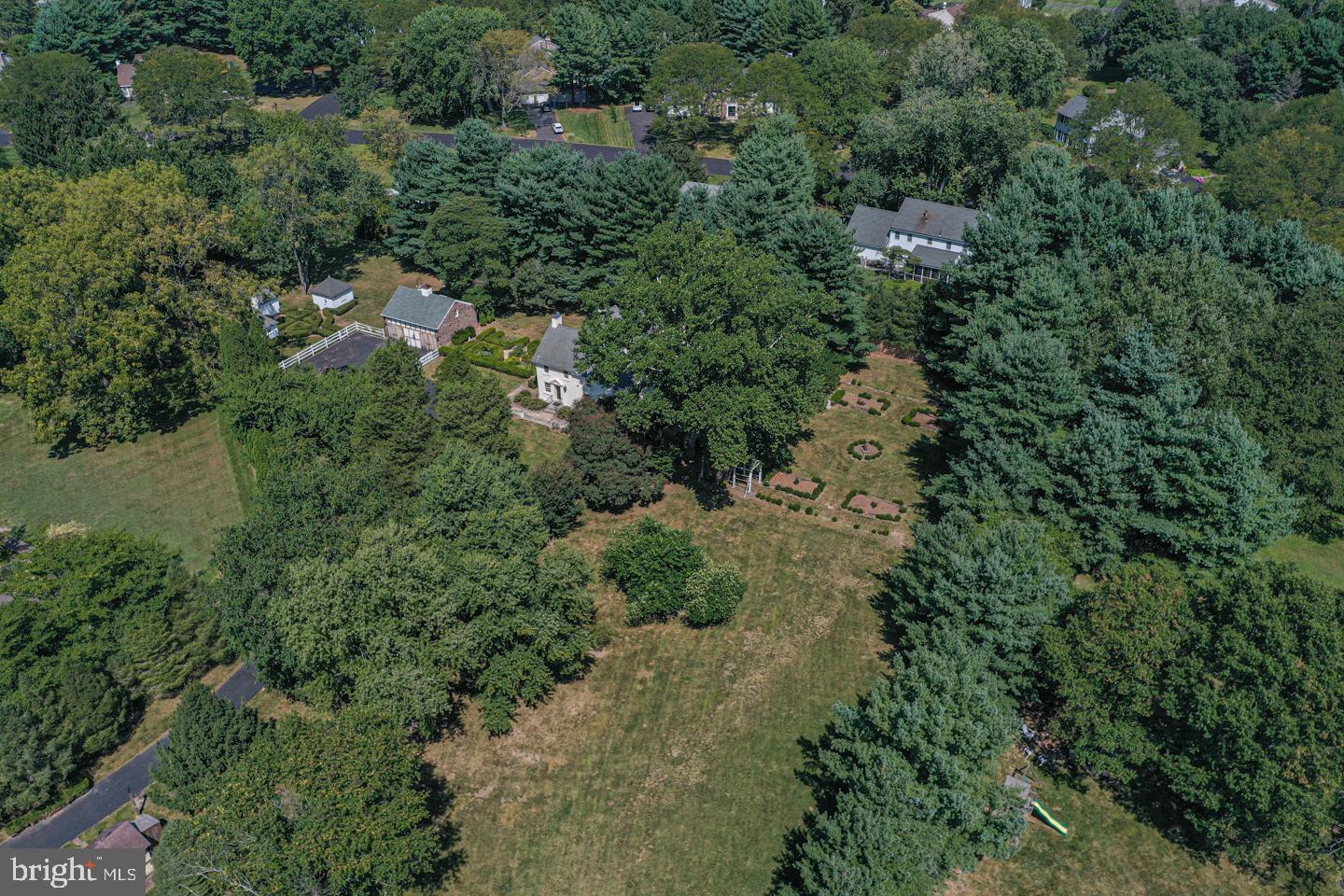 1224 Taylorsville Road Washington Crossing, PA 18977 - Photo 83 of 86 an aerial view of residential house with outdoor space and trees all around