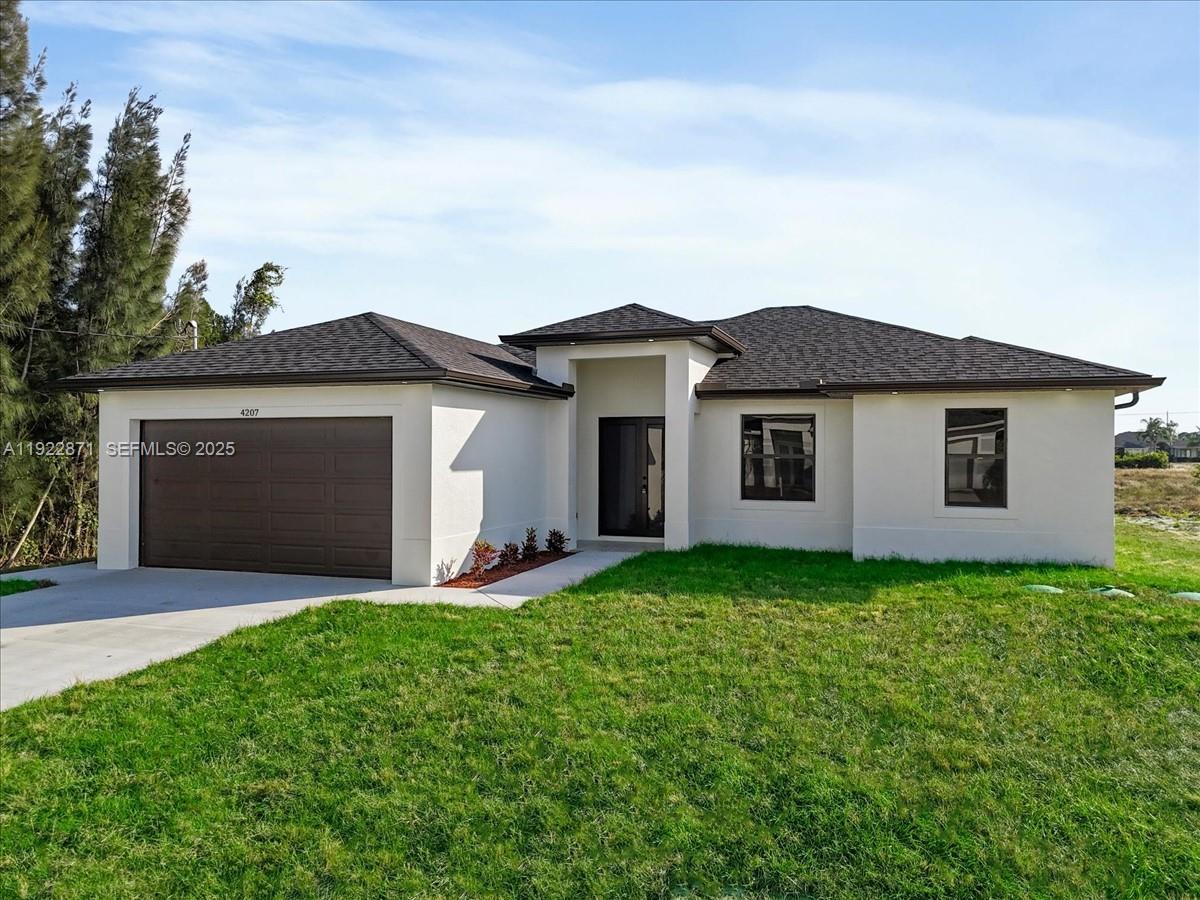 4207 28th Street Southwest Lehigh Acres, FL 33976 - Photo 32 of 39 a view of a house with a yard and large tree