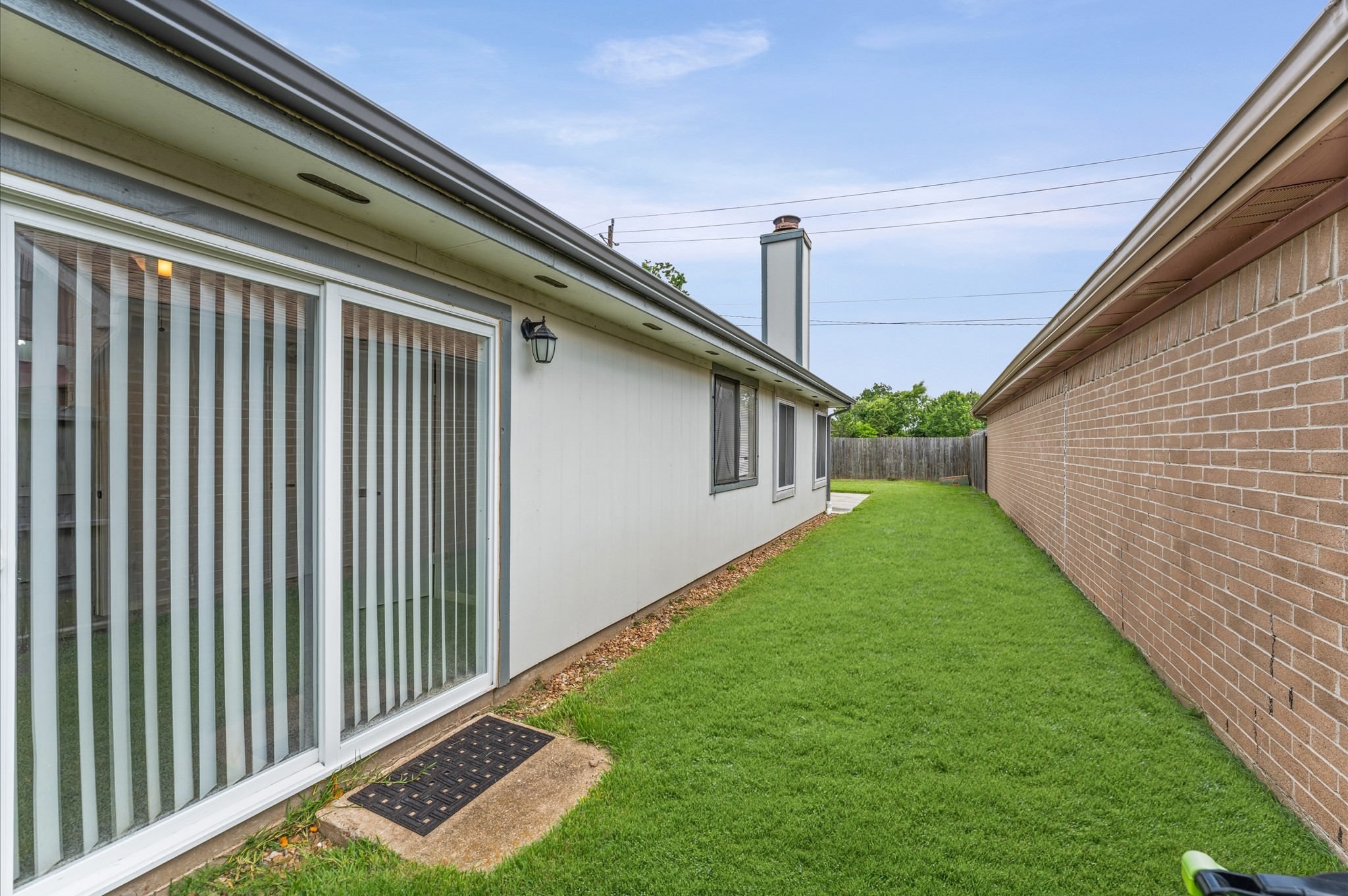 7810 Poitiers Drive Houston, TX 77071 - Photo 22 of 29 Newer gutters, improvements and sliding glass door! Roof is just 6 years young!