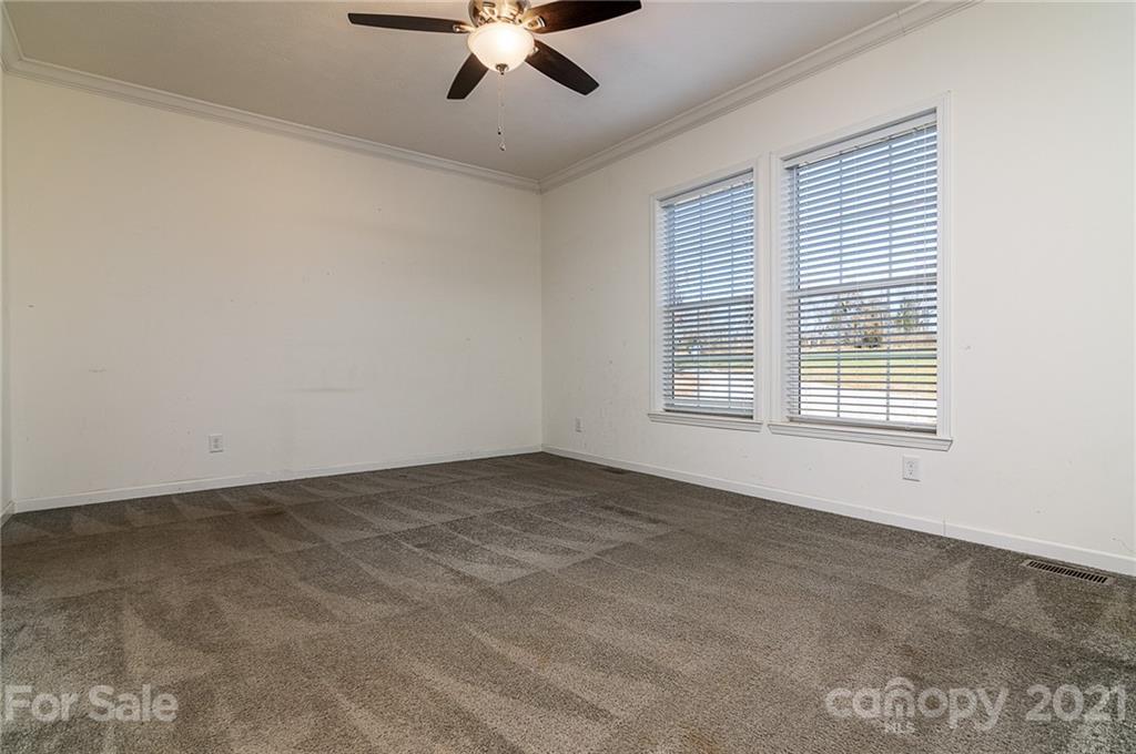 740 Renshaw Ford Road, Unit 5 Woodleaf, NC 27054 - Photo 18 of 30 a view of an empty room with a window