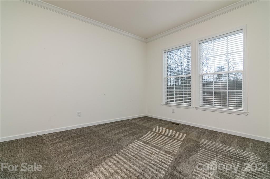 740 Renshaw Ford Road, Unit 5 Woodleaf, NC 27054 - Photo 23 of 30 a view of an empty room with a window