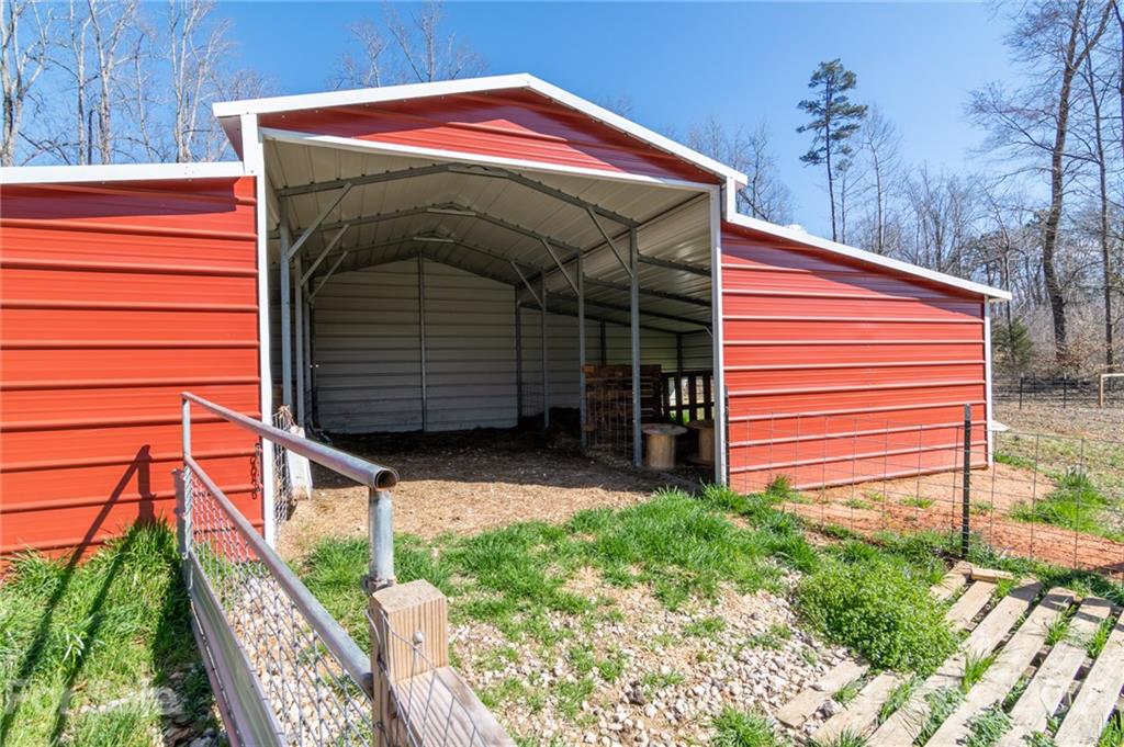 740 Renshaw Ford Road, Unit 5 Woodleaf, NC 27054 - Photo 5 of 30 a view of small house with a yard