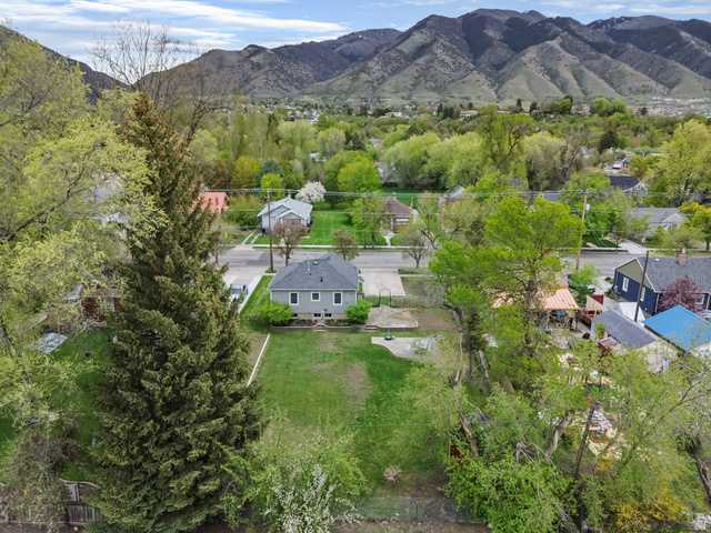 141 South 400 East Logan, UT 84321 - Photo 36 of 41 Aerial perspective of suburban area with a mountainous background